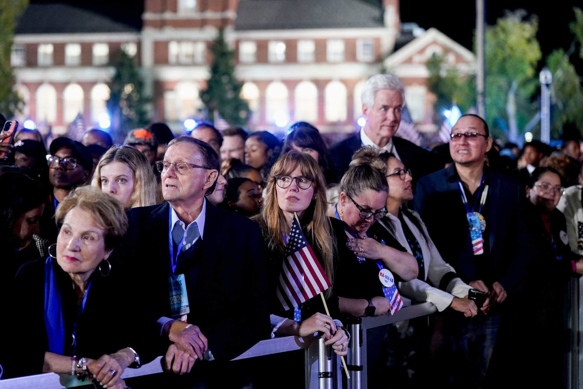 Attendees react during an election night event with US Vice President Kamala Harris, not pictured, in Washington, DC, US, on Tuesday, Nov. 5, 2024. 