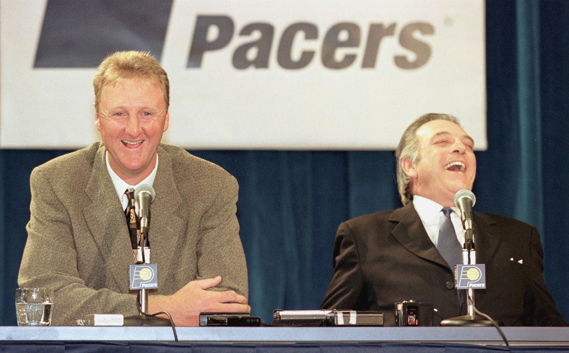 Former Boston Celtics' star Larry Bird (L) and Indiana Pacers President Donnie Walsh (R) speak with the press 12 May at a press conference held at Market Square Arena in Indianapolis. 
