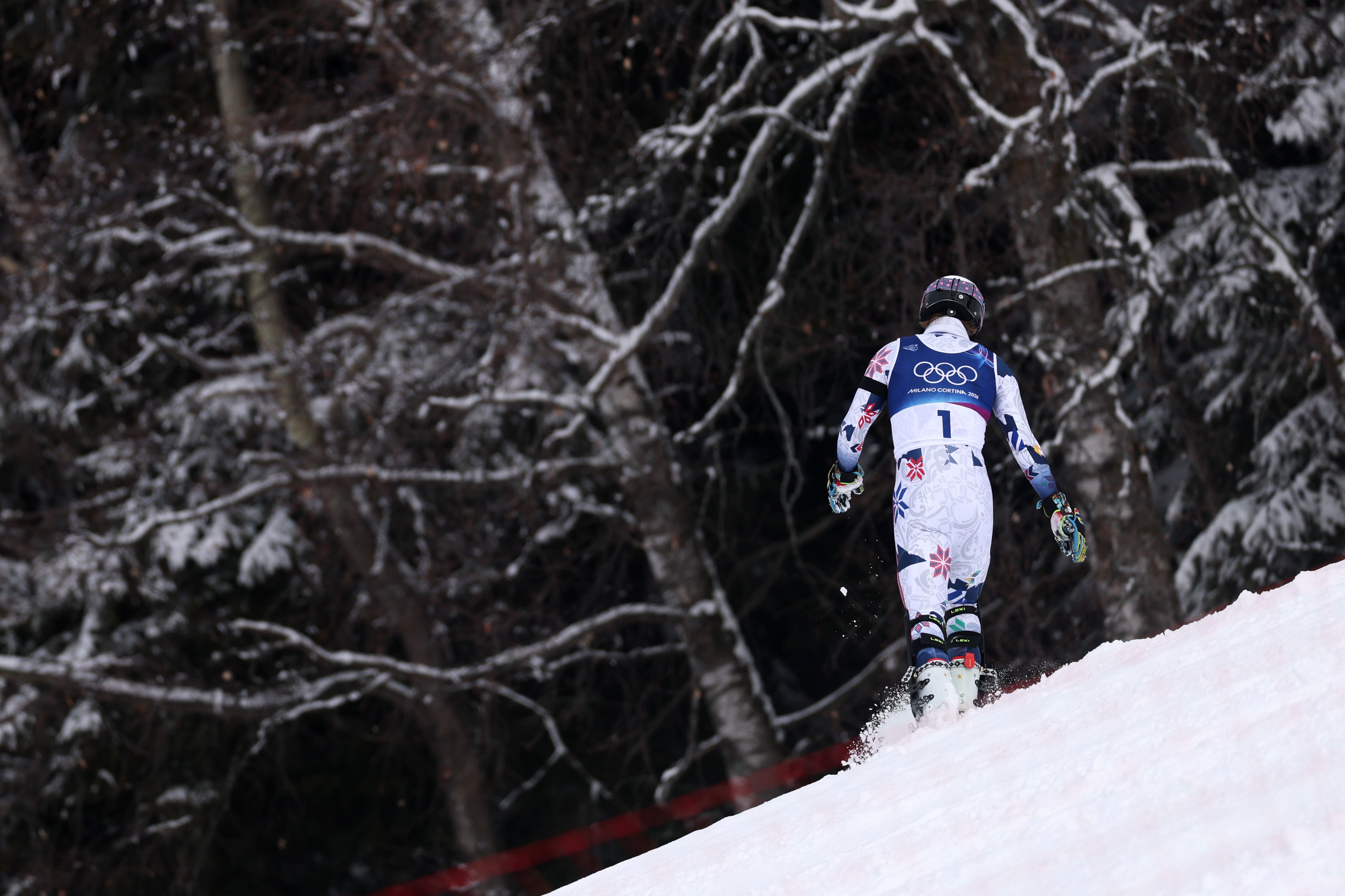 BORMIO, ITALY - FEBRUARY 16: Atle Lie McGrath of Team Norway walks off the course after not completing his second run of the Men's Slalom on day ten of the Milano Cortina 2026 Winter Olympics at Stelvio Alpine Skiing Centre on February 16, 2026 in Bormio, Italy. (Photo by Christian Petersen/Getty Im