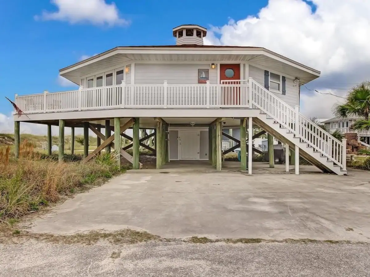Exterior of home near Fernandina Beach, Florida with wraparound deck. 