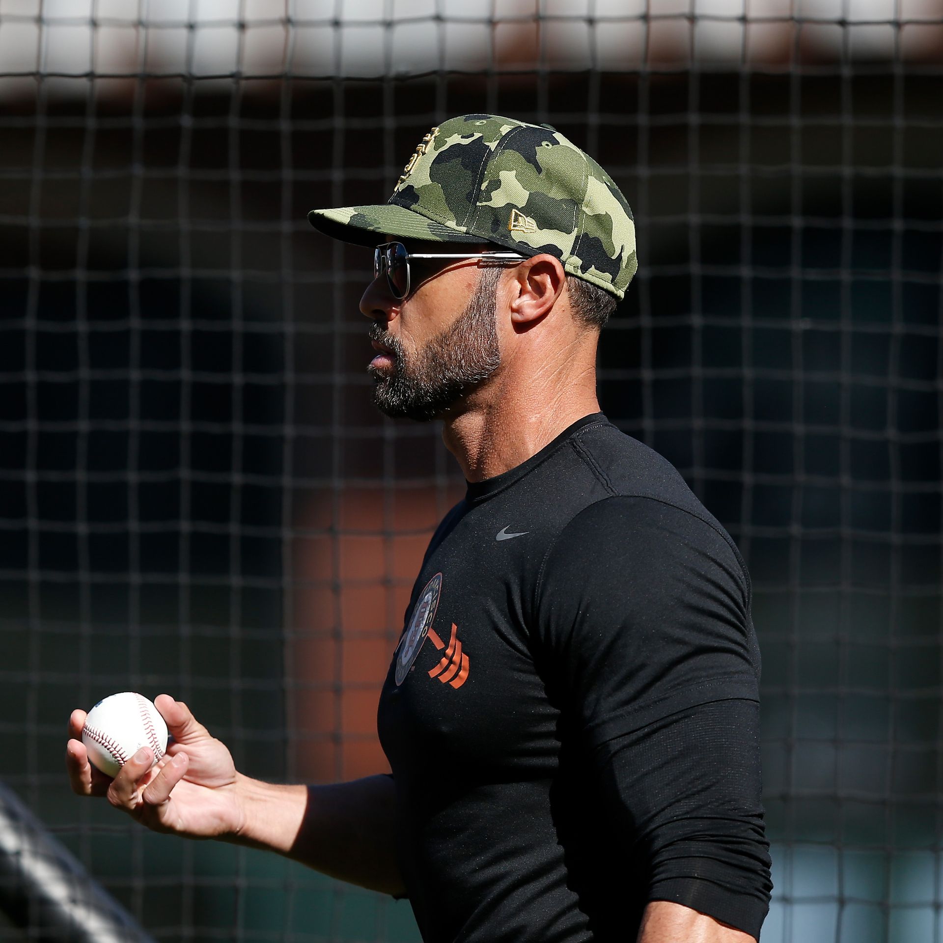 Manager Gabe Kapler of the San Francisco Giants looks on while