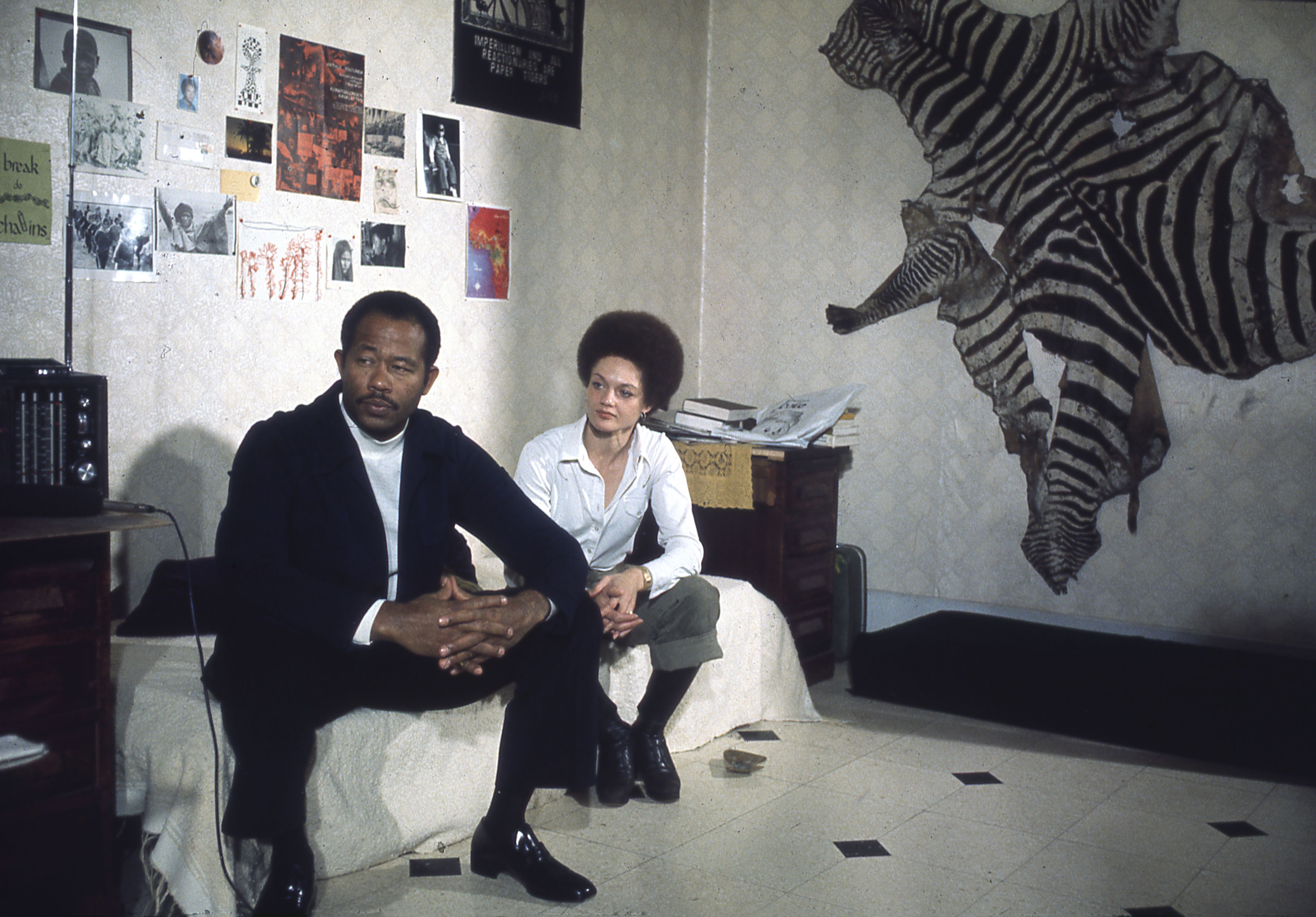 Black Panther and writer Eldridge Cleaver, an exile from American justice, and wife Kathleen sit in their apartment in Paris France during their exile circa 1974.