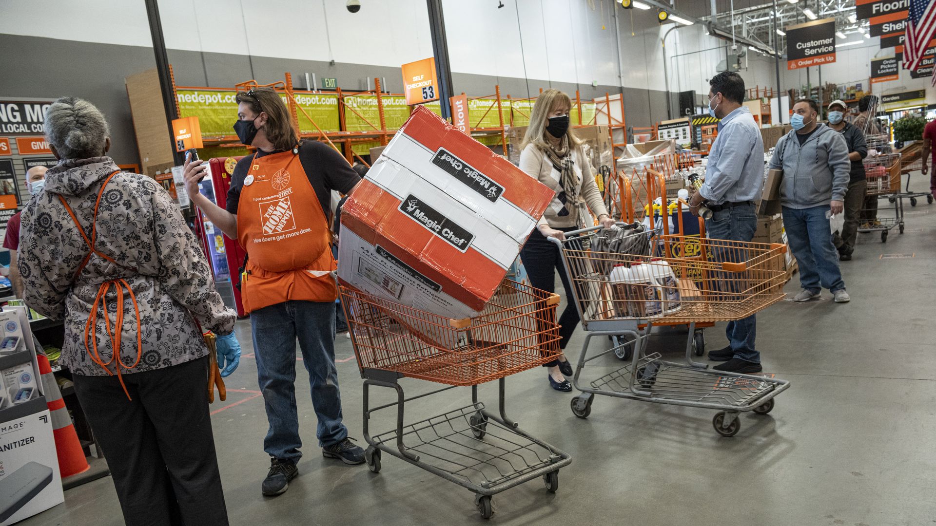 Customers in a Home Depot in Pleasanton, California, in February 2021.