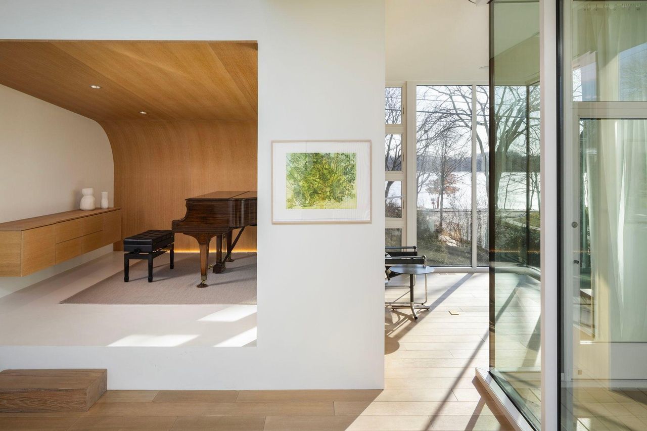 A room with a grand piano.