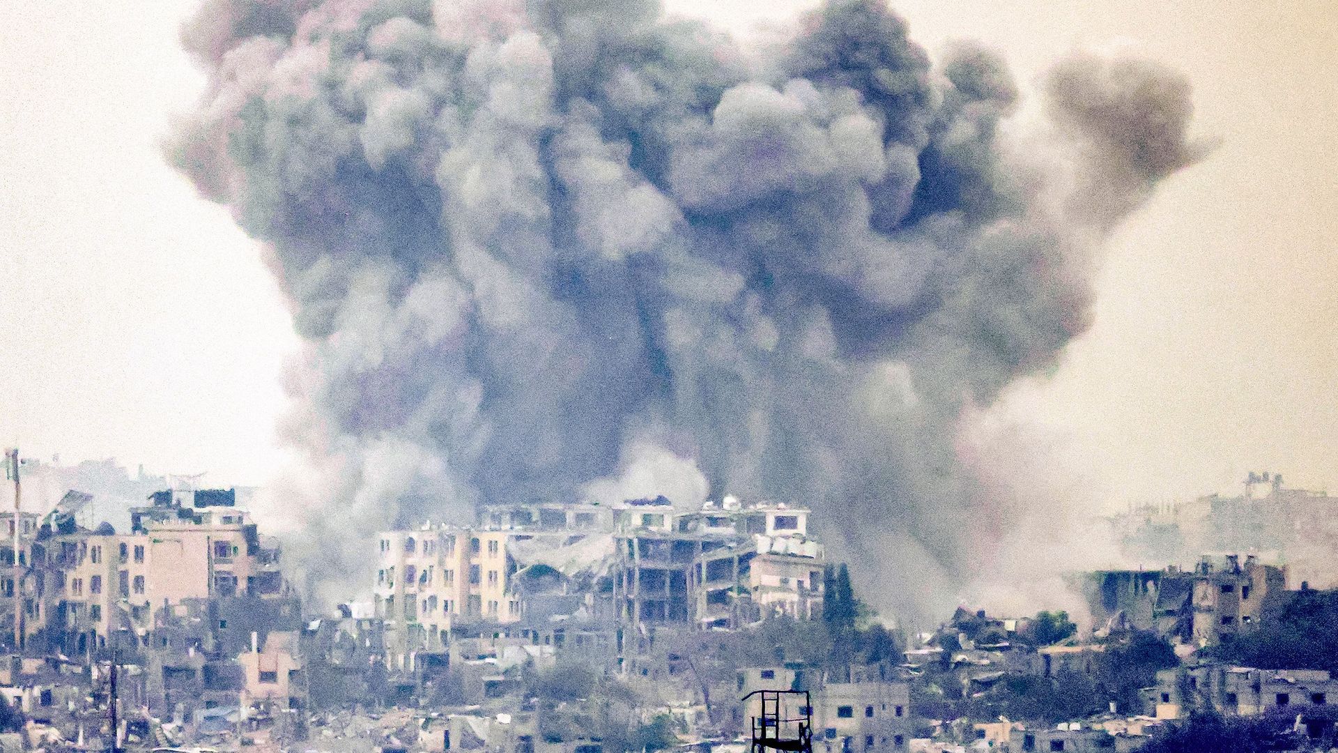 This picture taken from a position along the border with the Gaza Strip near Israel's southern city of Sderot on October 27, 2023 shows a smoke plume ascending following Israeli bombardment over the northern Gaza Strip
