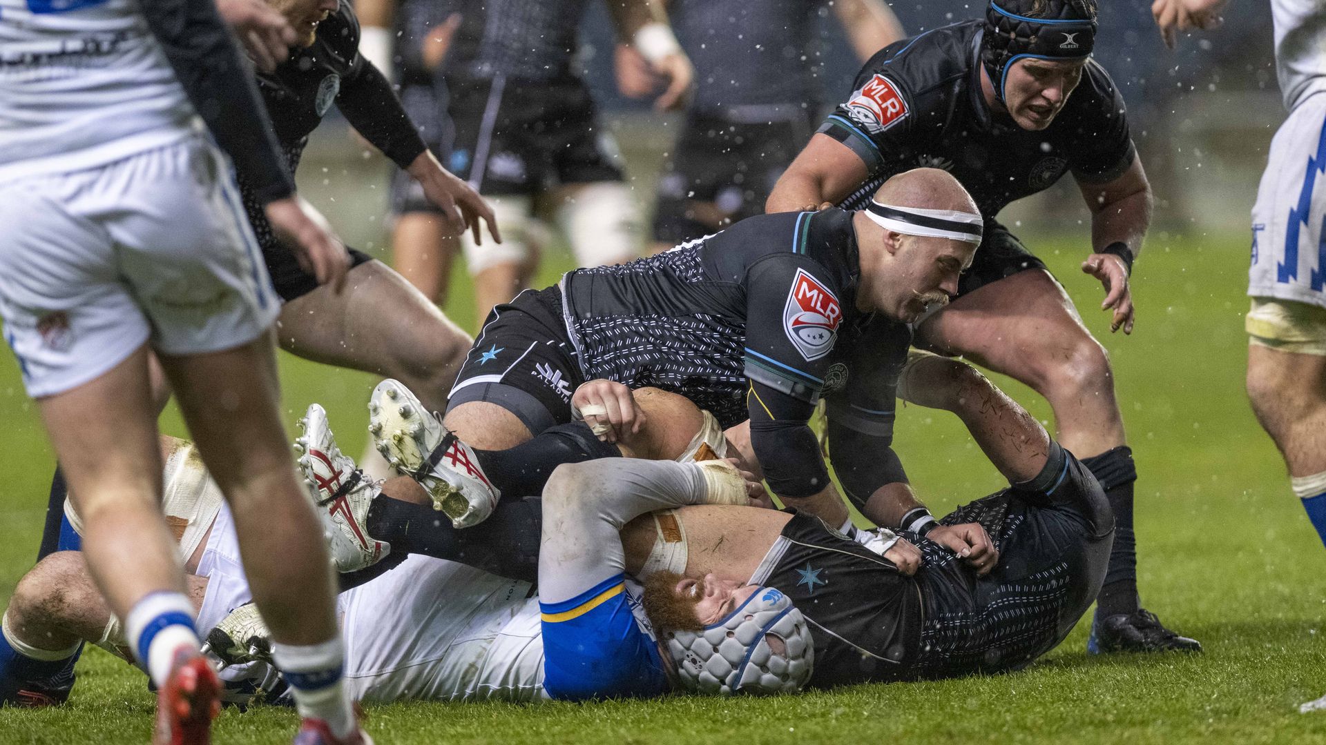 Photo of rugby players during a match 