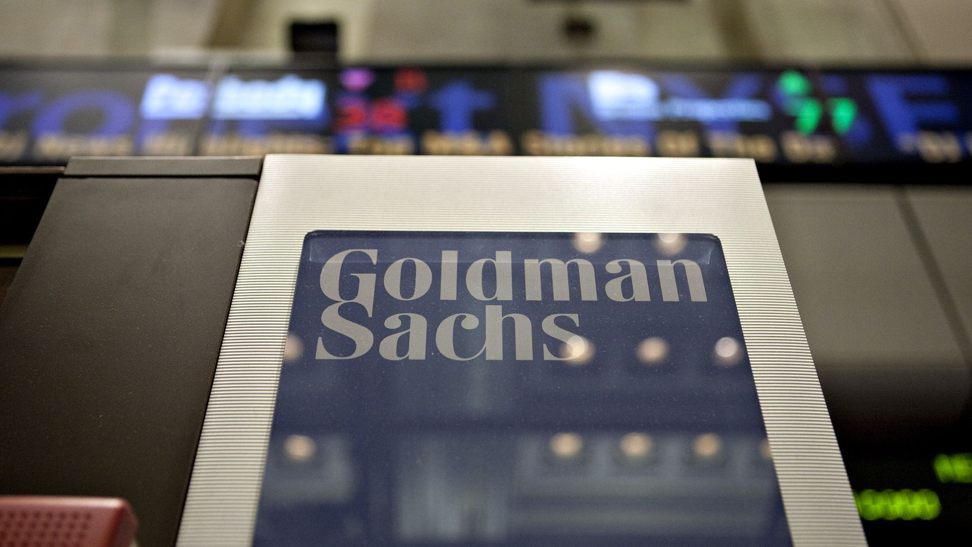Goldman Sachs logo hanging on the floor of the New York Stock Exchange