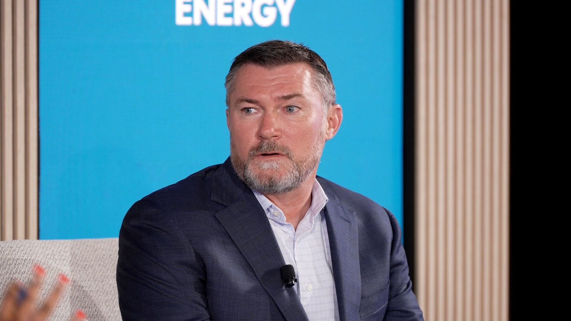 Investor David Burt speaks at an Axios House event at Climate Week