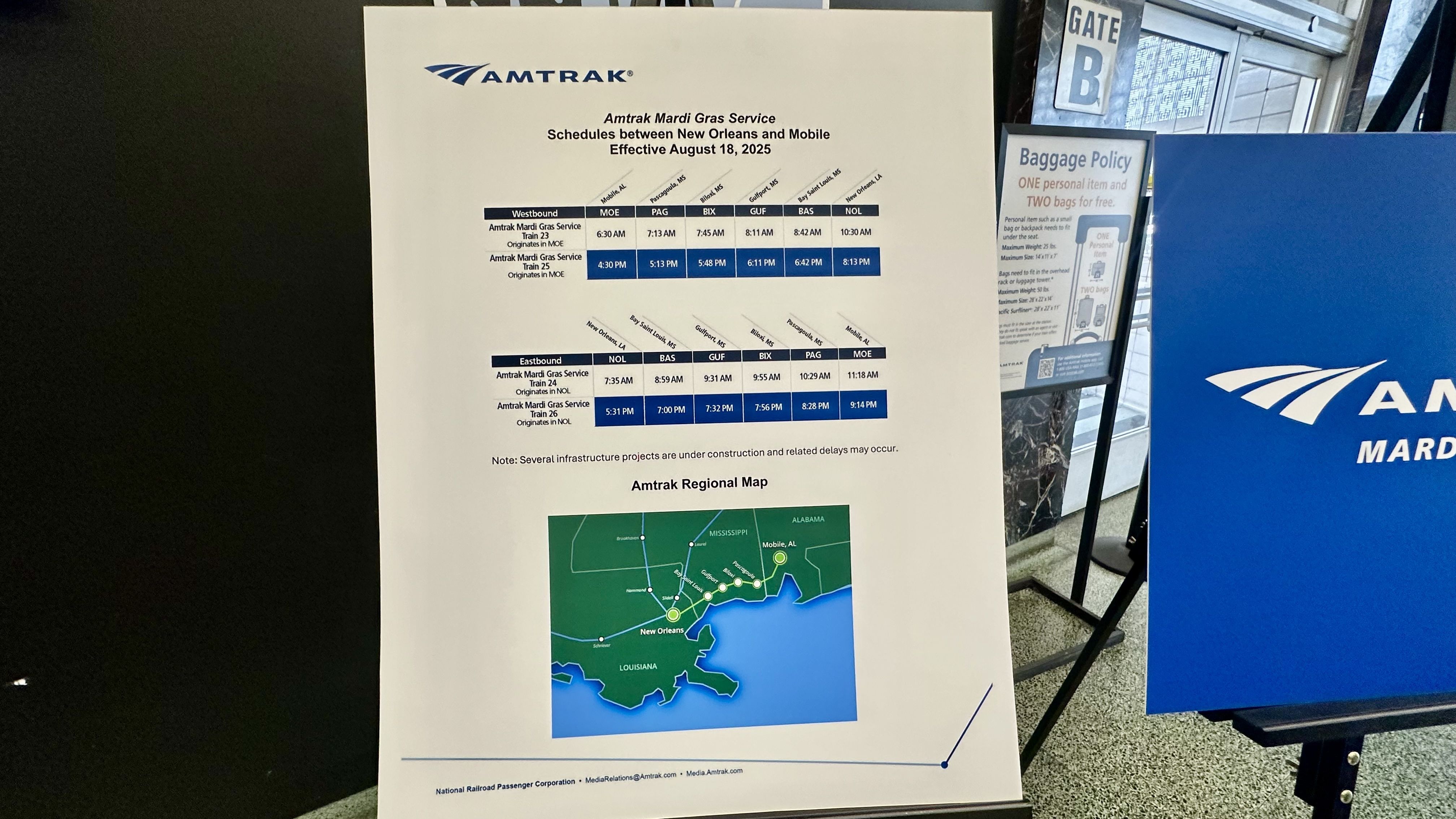 Amtrak Mardi Gras Service schedule for trains between New Orleans and Mobile, effective August 18, 2025, with westbound and eastbound times and a regional map showing the route in Louisiana and Alabama.
