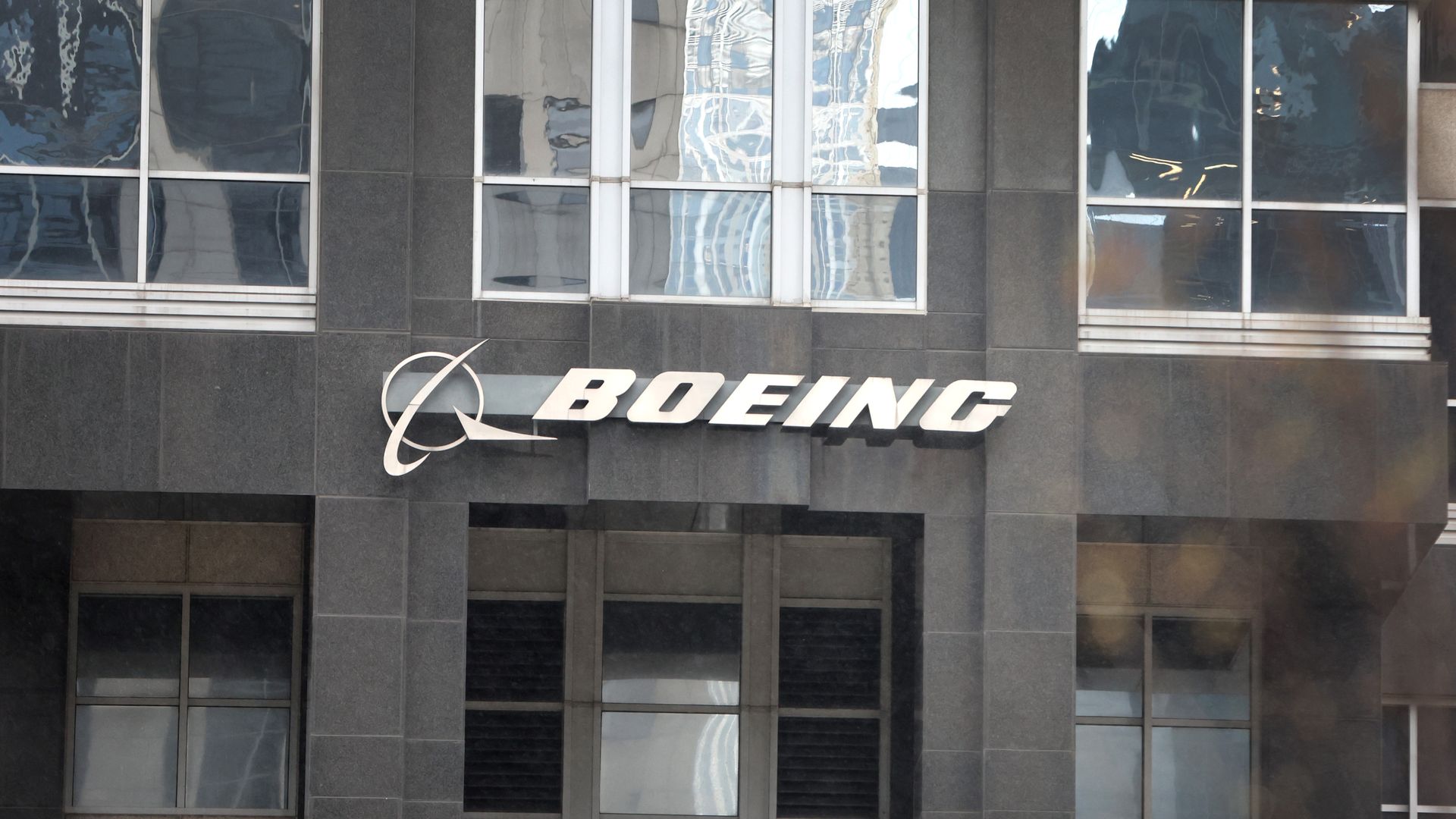 The Boeing Company logo hangs outside of the company's headquarters on May 5, 2022 in Chicago, Illinois.