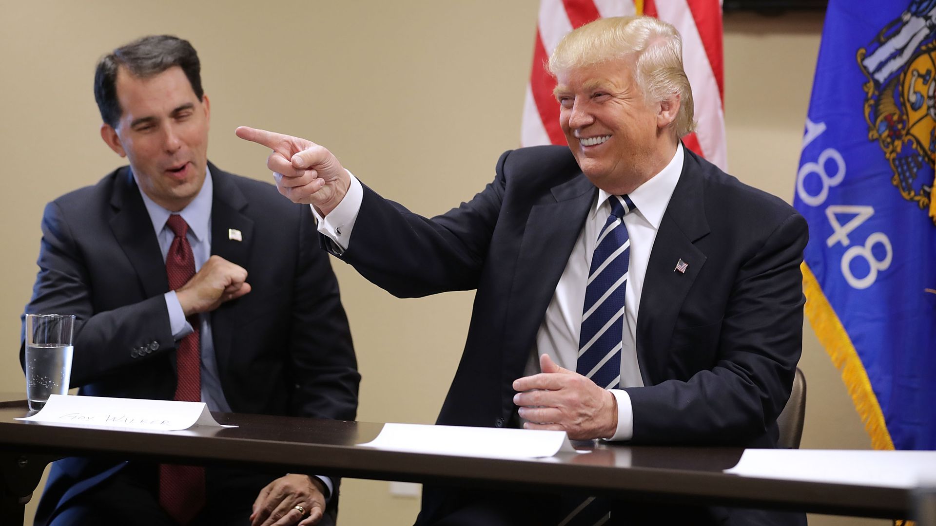 Trump pointing and laughing with Scott Walker