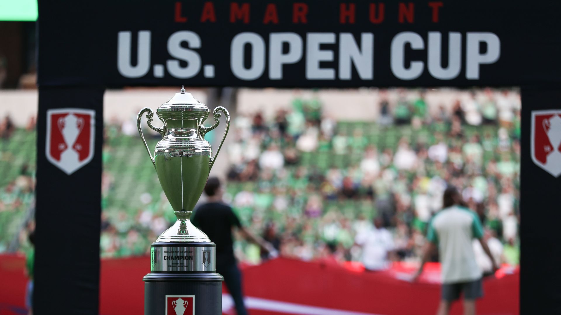 A photo of the Lamar Hunt U.S. Open Cup on the field
