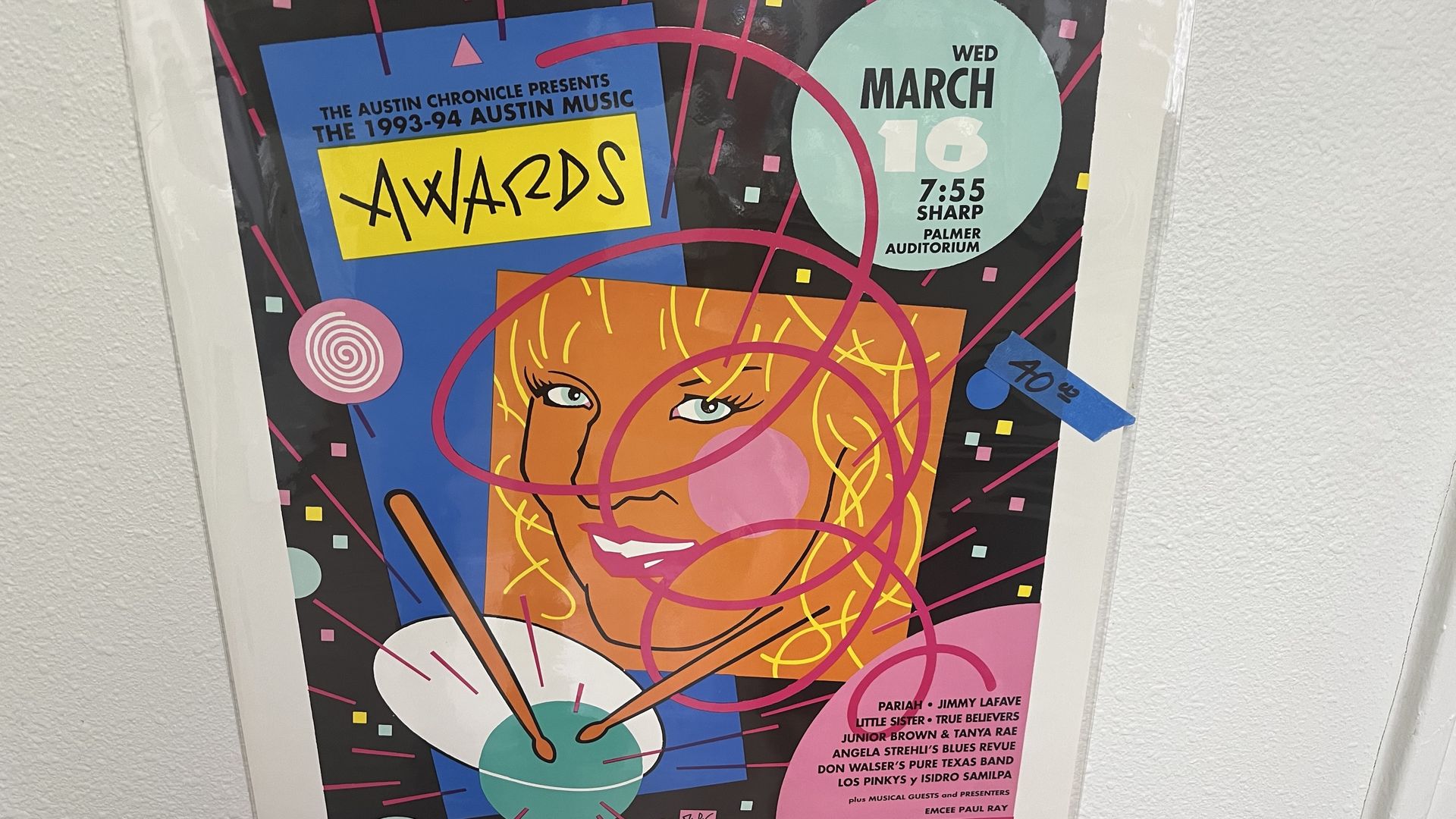 Colorful retro poster advertising "The Austin Chronicle Presents The 1993-94 Austin Music Awards". Pink, blue, and yellow geometric shapes form a stylized face; a mint circle reads "MARCH 16" and "7:55 SHARP" for Palmer Auditorium.