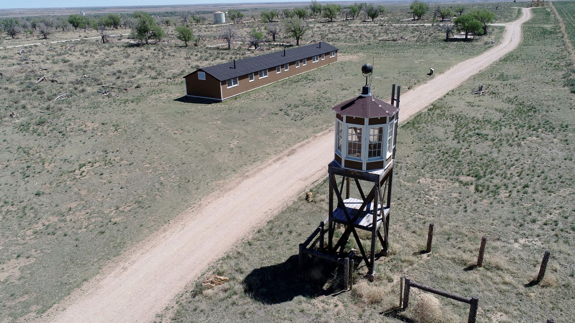 Photo showing a guard tower and barracks 