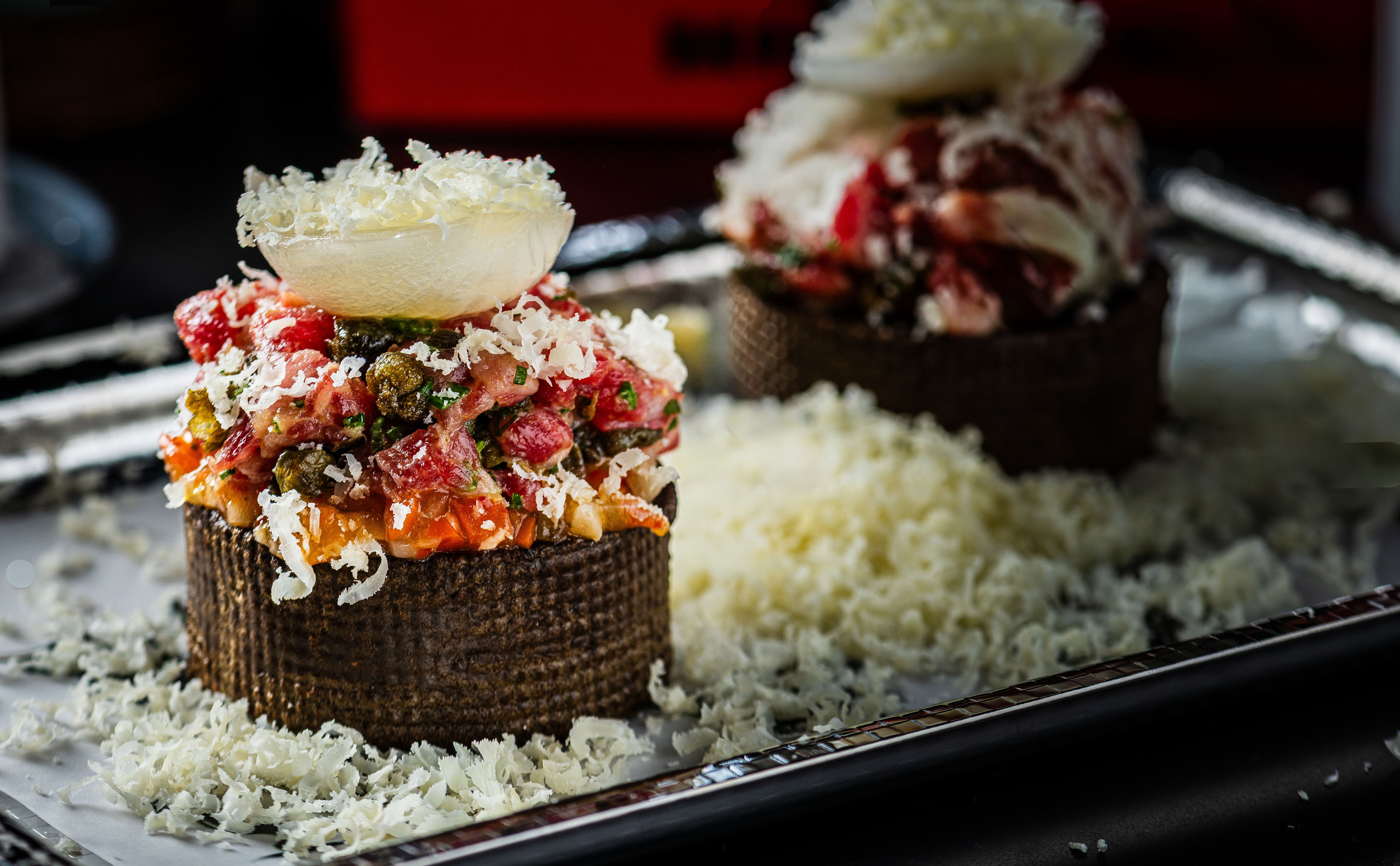 Fun snacks include steak tartare "eclaires" with gouda cheese. Photo: Courtesy Rey Lopez