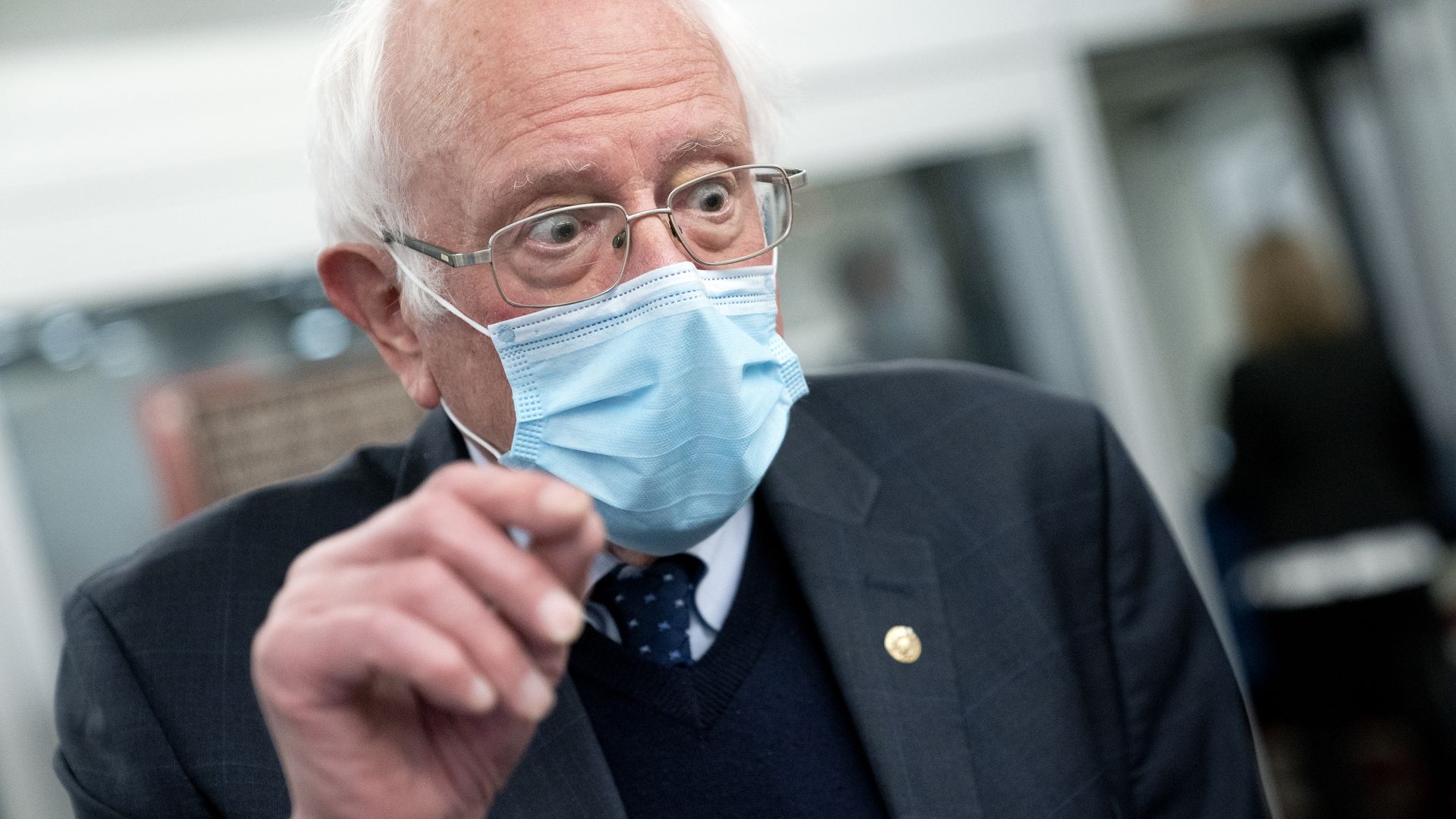 Bernie Sanders wears a face mask