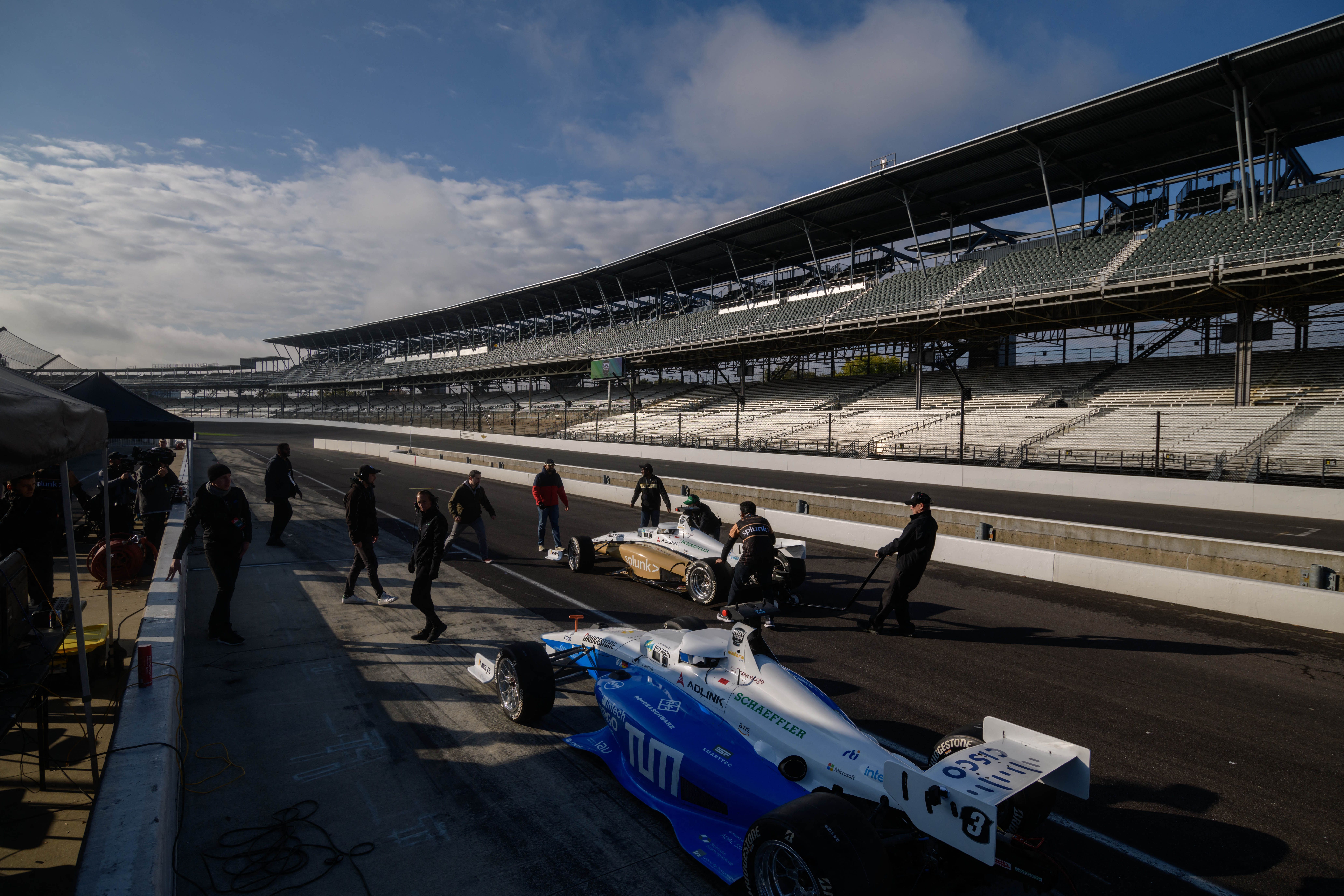  Cars are lined up on the grid during a practice session of the Indy Autonomous Challenge race on Oct. 23. 