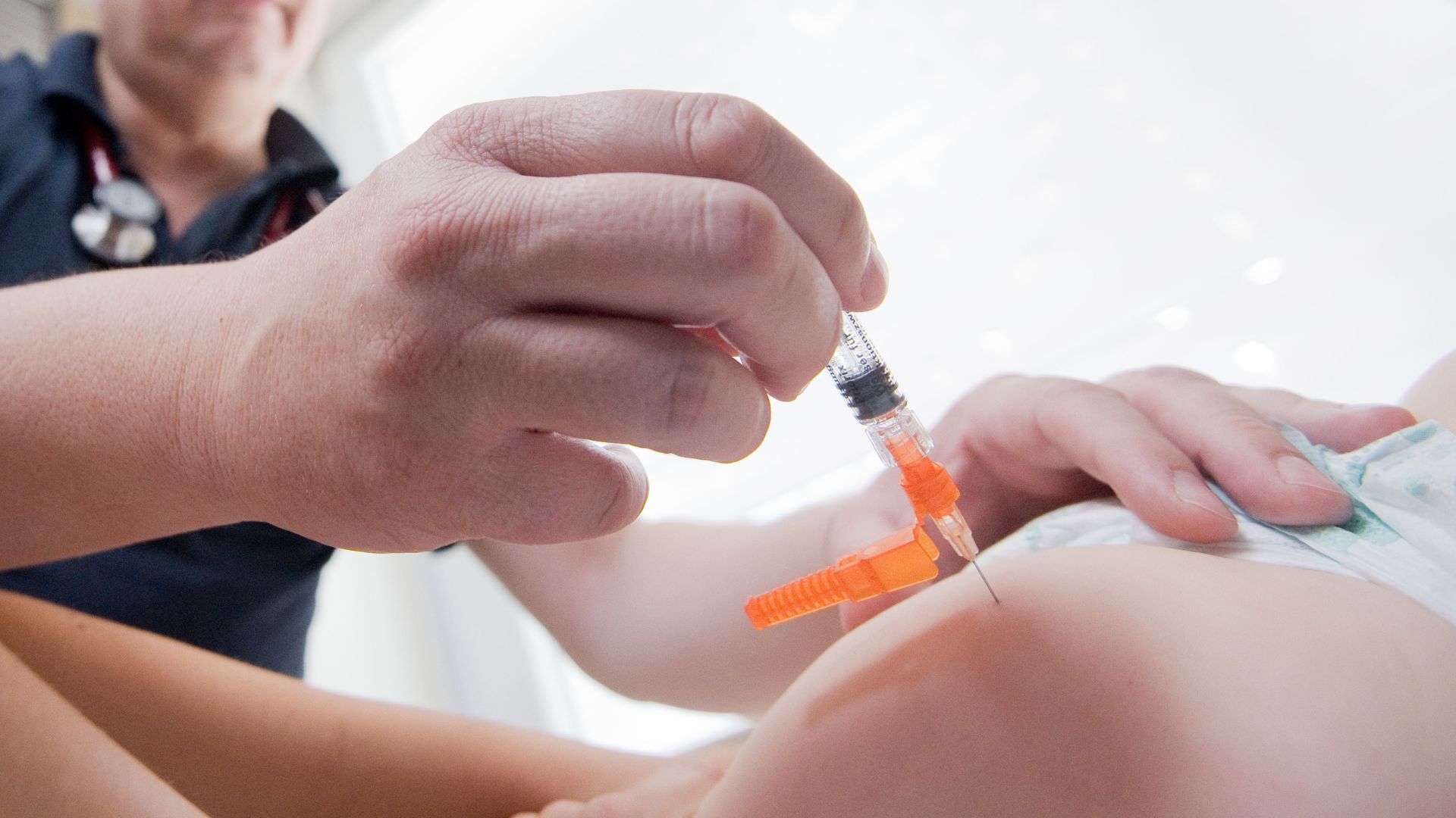 A patient receiving the measles vaccine
