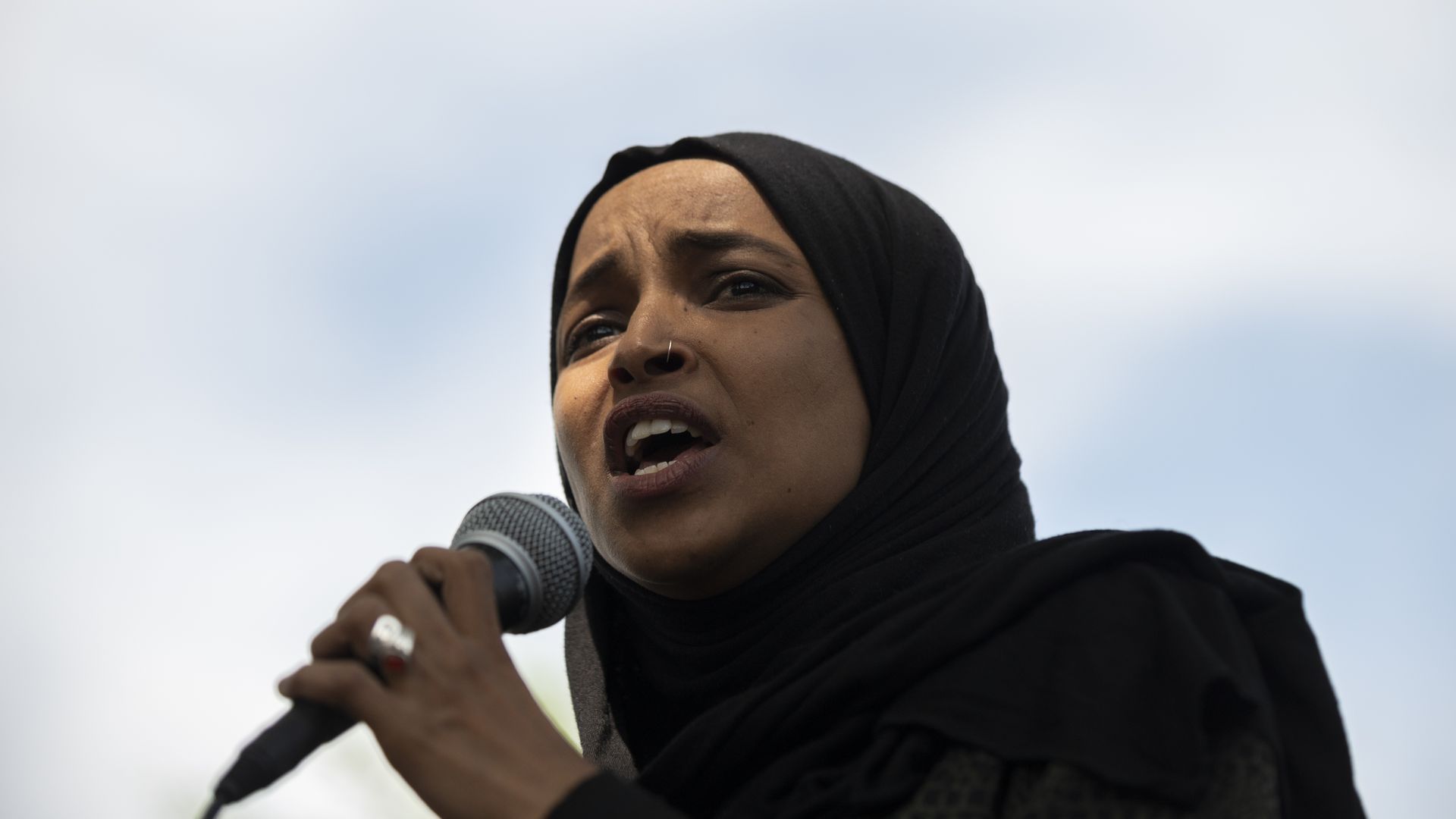  Rep. Ilhan Omar (D-MN) speaks to a crowd gathered for a march to defund the Minneapolis Police Department on June 6, 2020 in Minneapolis, Minnesota. 