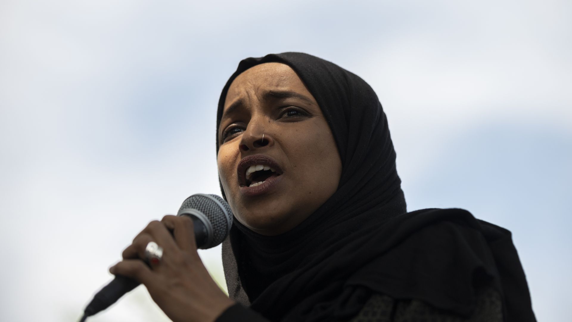Rep. Ilhan Omar (D-MN) speaks to a crowd gathered for a march to defund the Minneapolis Police Department on June 6, 2020 in Minneapolis, Minnesota.