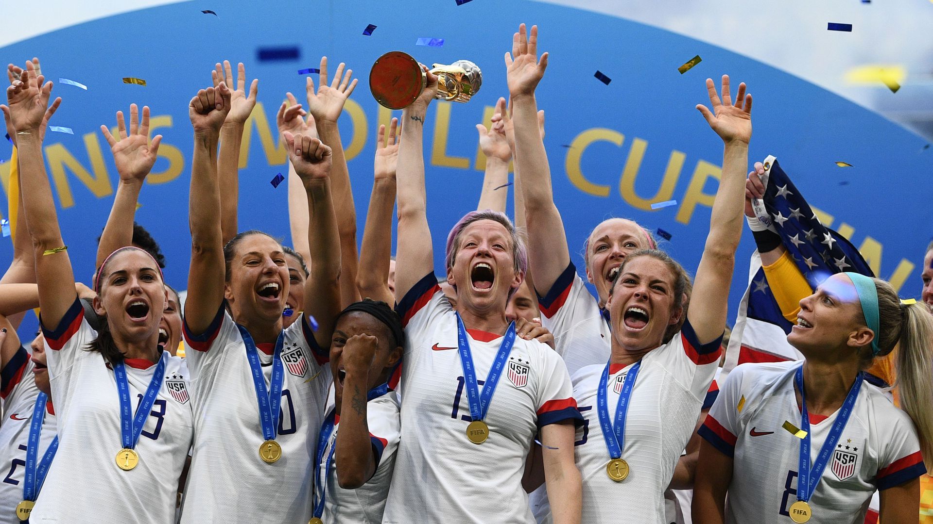 The U.S. players with their 4th World Cup in Lyon, central-eastern France.