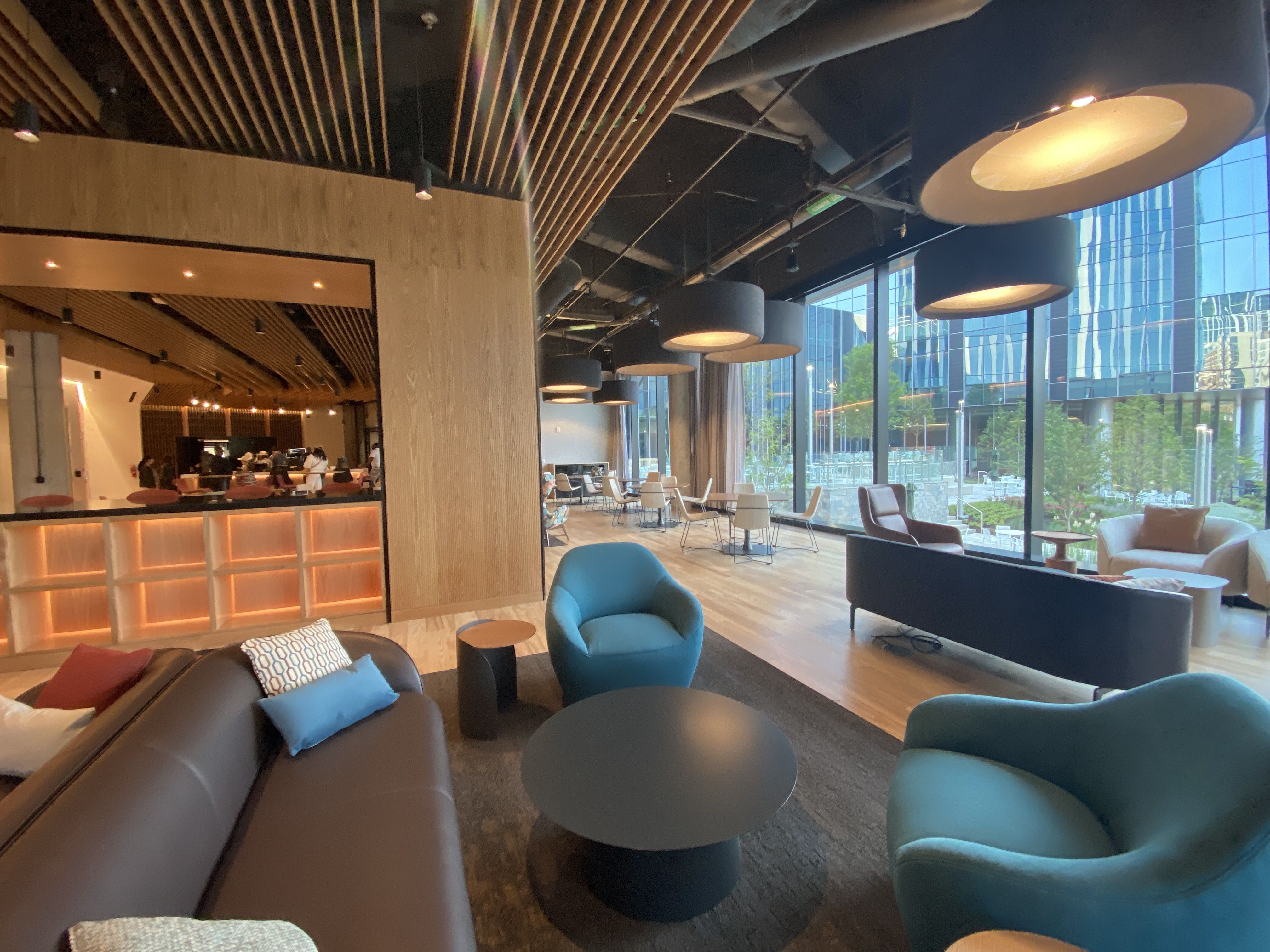 The common area with chairs and a coffee bar.