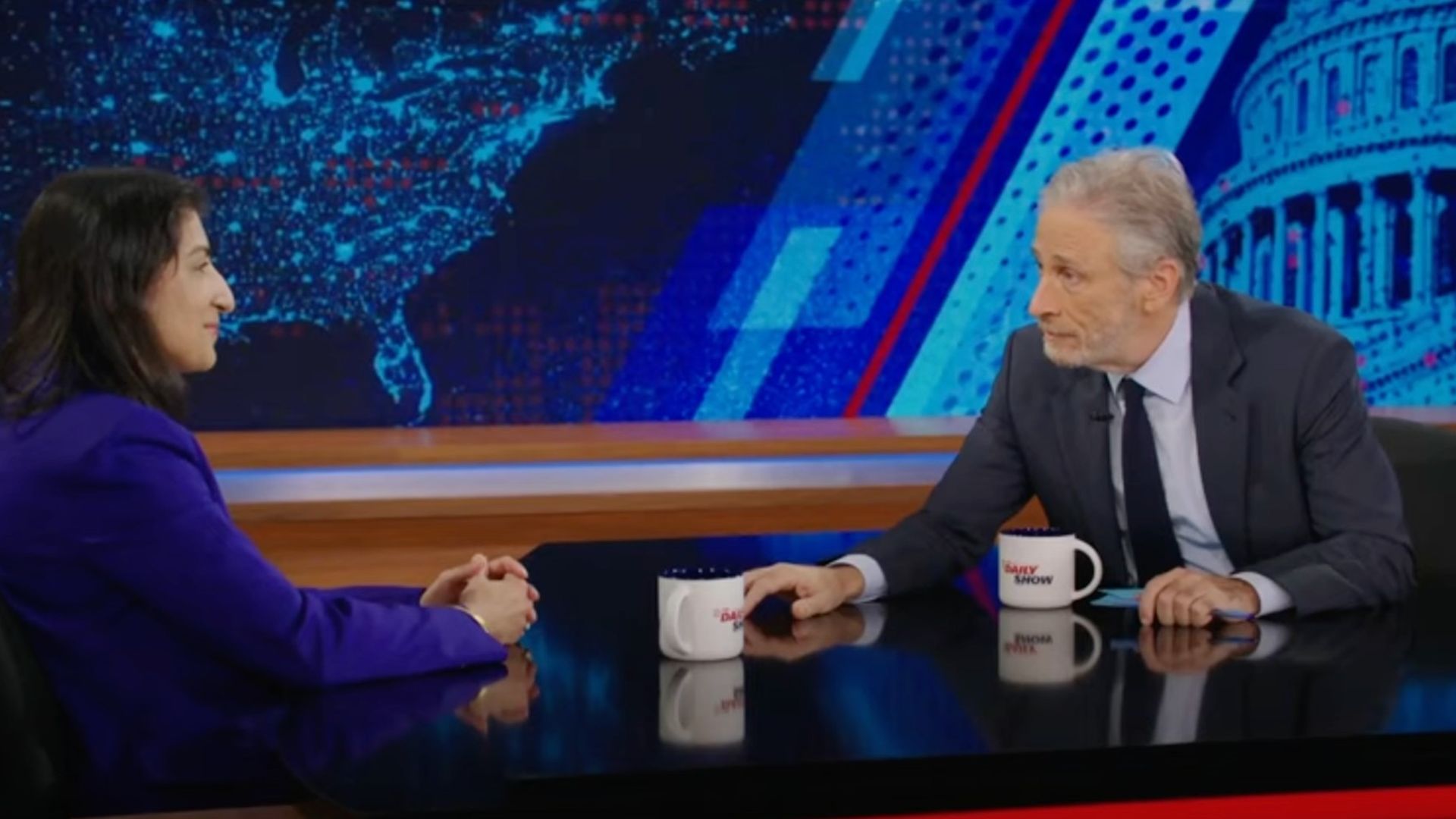  FTC chair Lina Khan being interviewed by Jon Stewart on "The Daily Show" on Monday night.