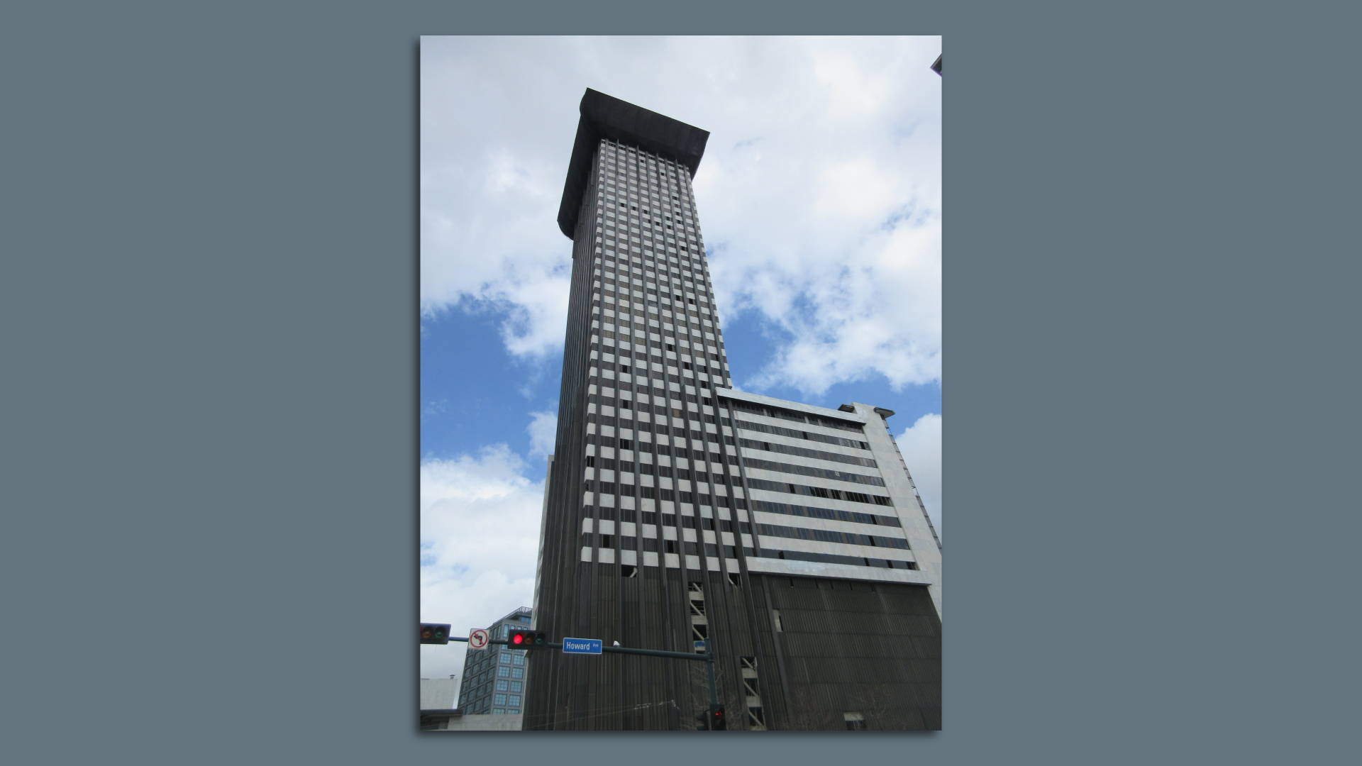 The Plaza Tower building is viewed from below in downtown New Orleans.