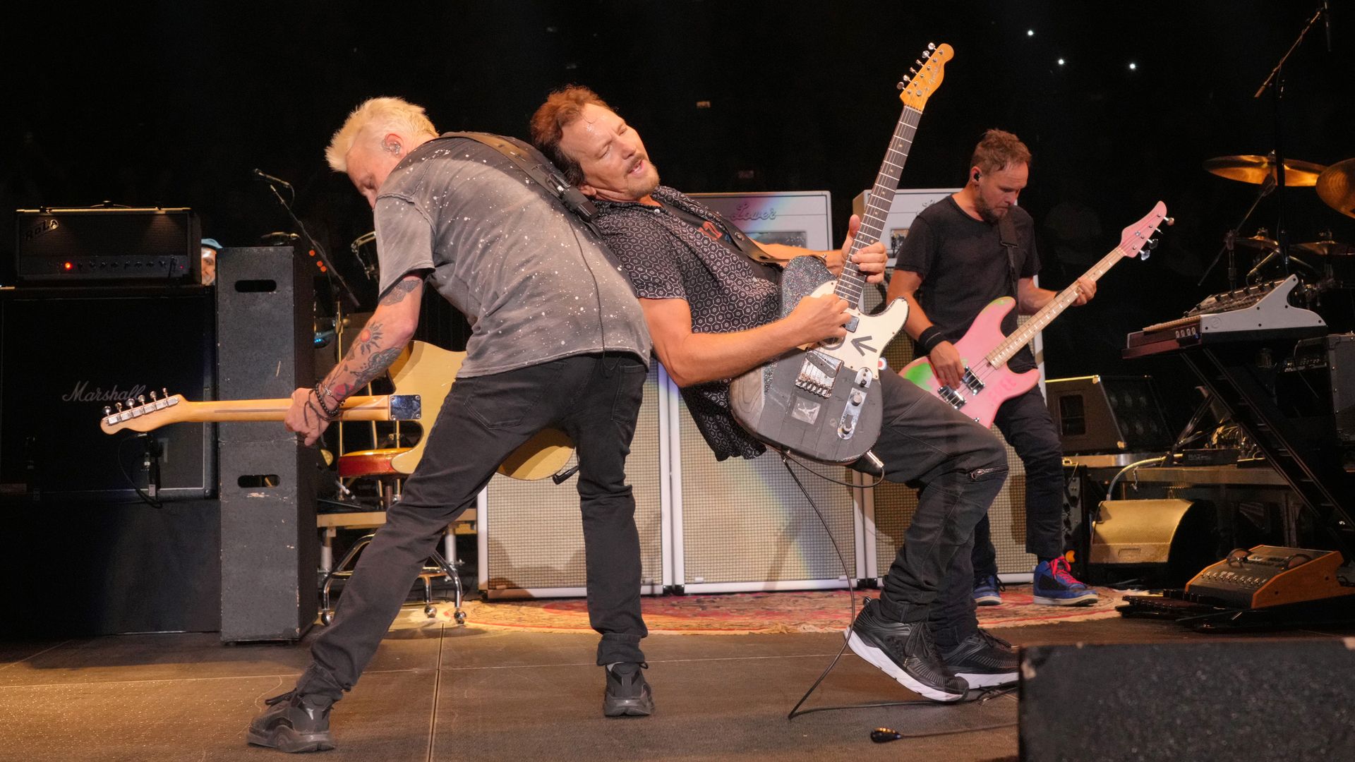 Mike McCready and Eddie Vedder of Pearl Jam perform onstage.