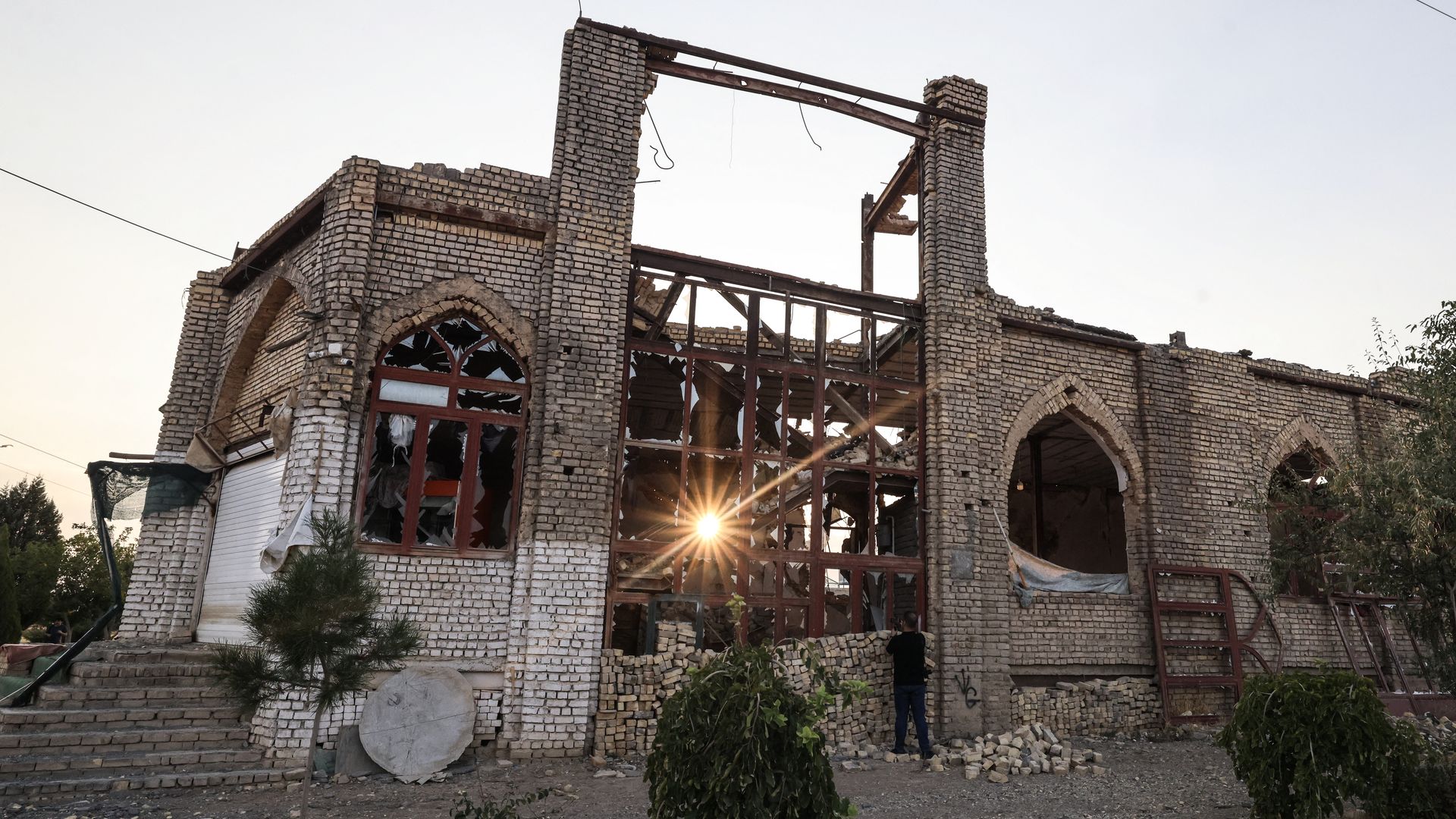 A photograph taken during a media tour organized by Iranian authorities shows a mosque they say was damaged in a U.S. missile strike months ago. 