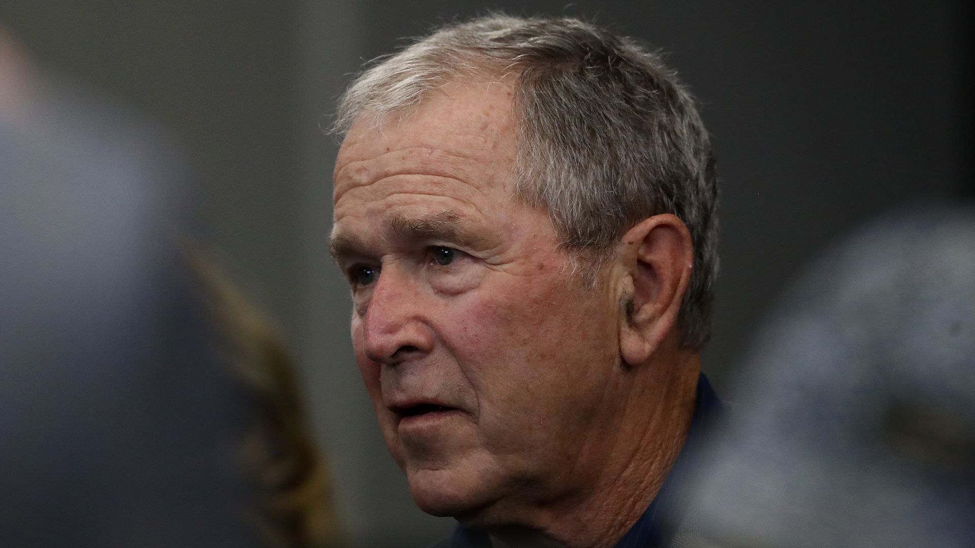 In this image, President George W. Bush stands