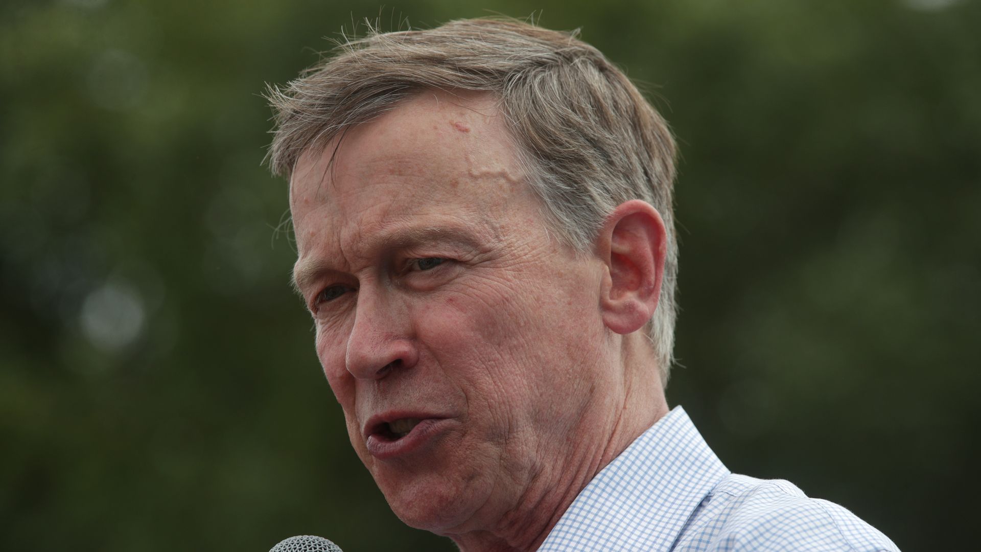 Democratic presidential candidate and former Governor of Colorado John Hickenlooper delivers a campaign speech at the Des Moines Register Political Soapbox