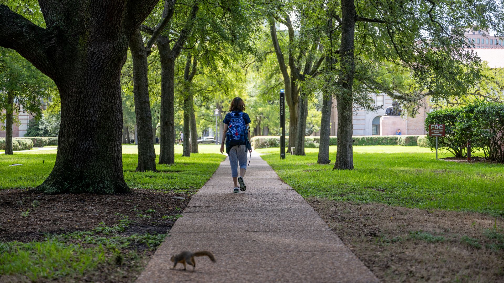 A student walks to class at Rice University on August 29, 2022 in Houston, Texas.