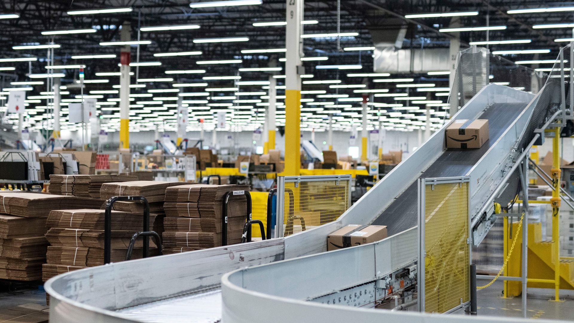 Package moves along conveyer belt in warehouse