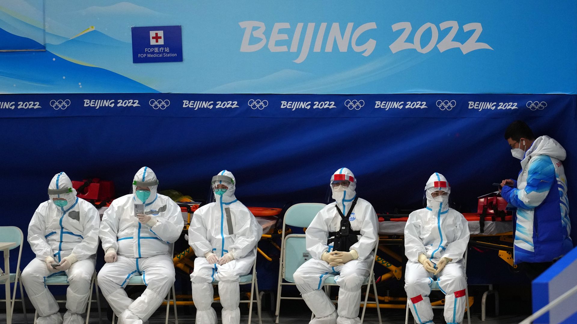 Medical staff wearing personal protective clothing work at the National Indoor Stadium on February 3, 2022 in Beijing, China.