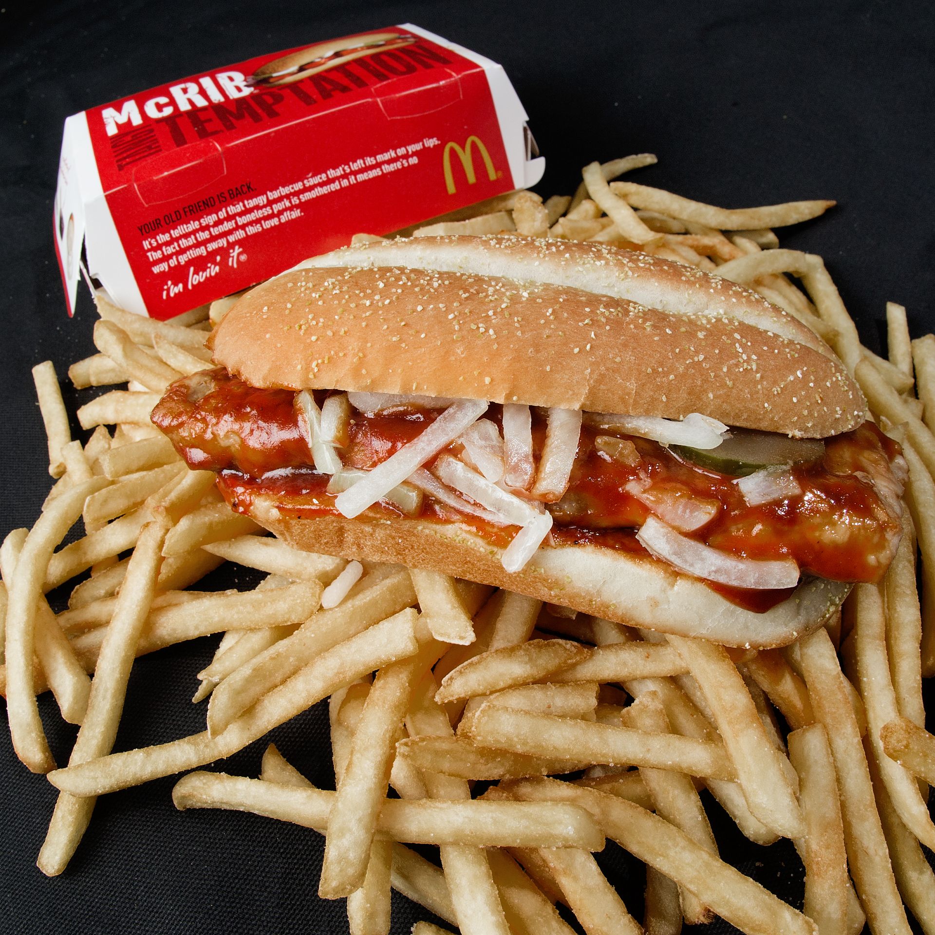 A photo of a McDonalds' McRib sandwich