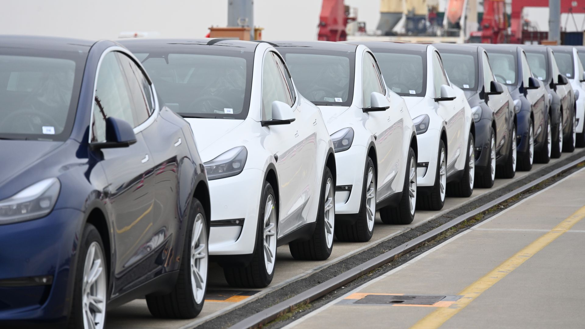  Tesla Model Y and Model 3 vehicles at a dock in Shanghai, China, in May 2022.