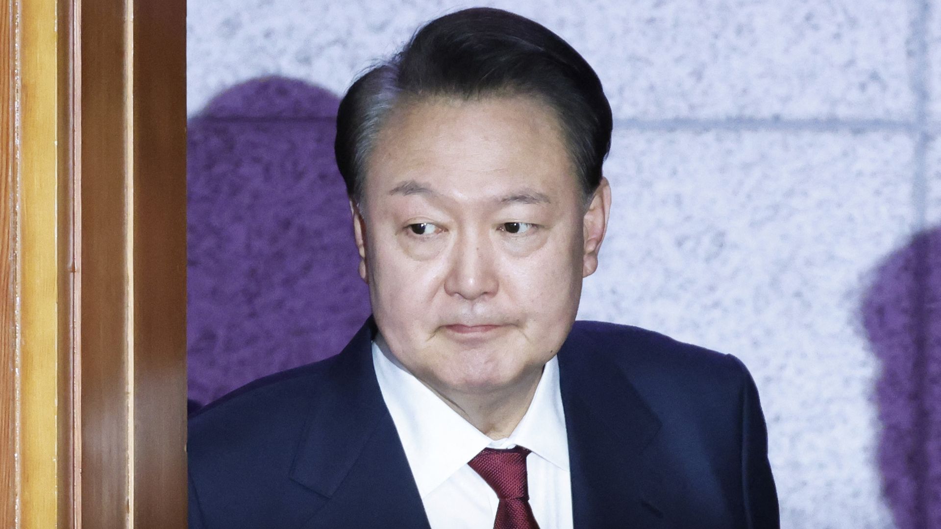  South Korea's impeached President Yoon Suk Yeol arrives to attend the fourth hearing of his impeachment trial over his short-lived imposition of martial law at the Constitutional Court in Seoul on January 23, 2025