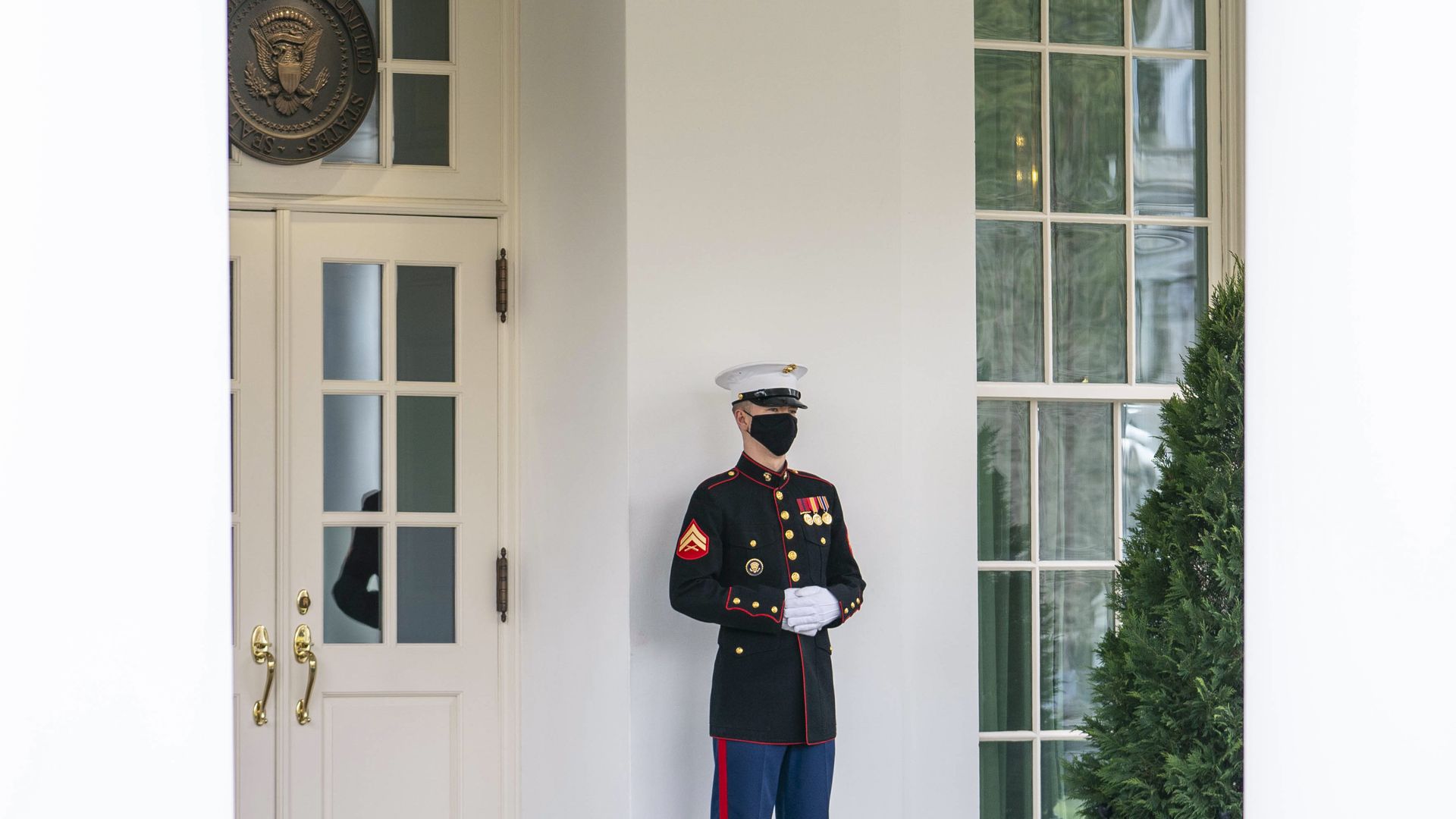 A Marine sentry is seen at his post outside the entrance to the West Wing.