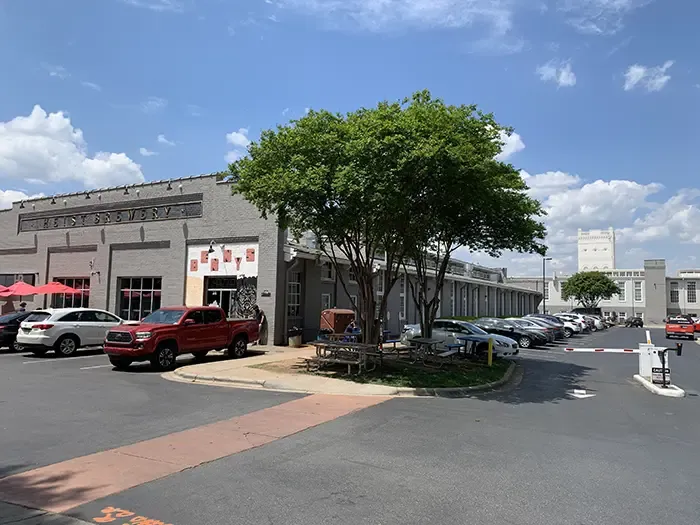 Highland Park Mill No. 3, which is now apartments and Heist Brewery (Katie Peralta Soloff/Axios)