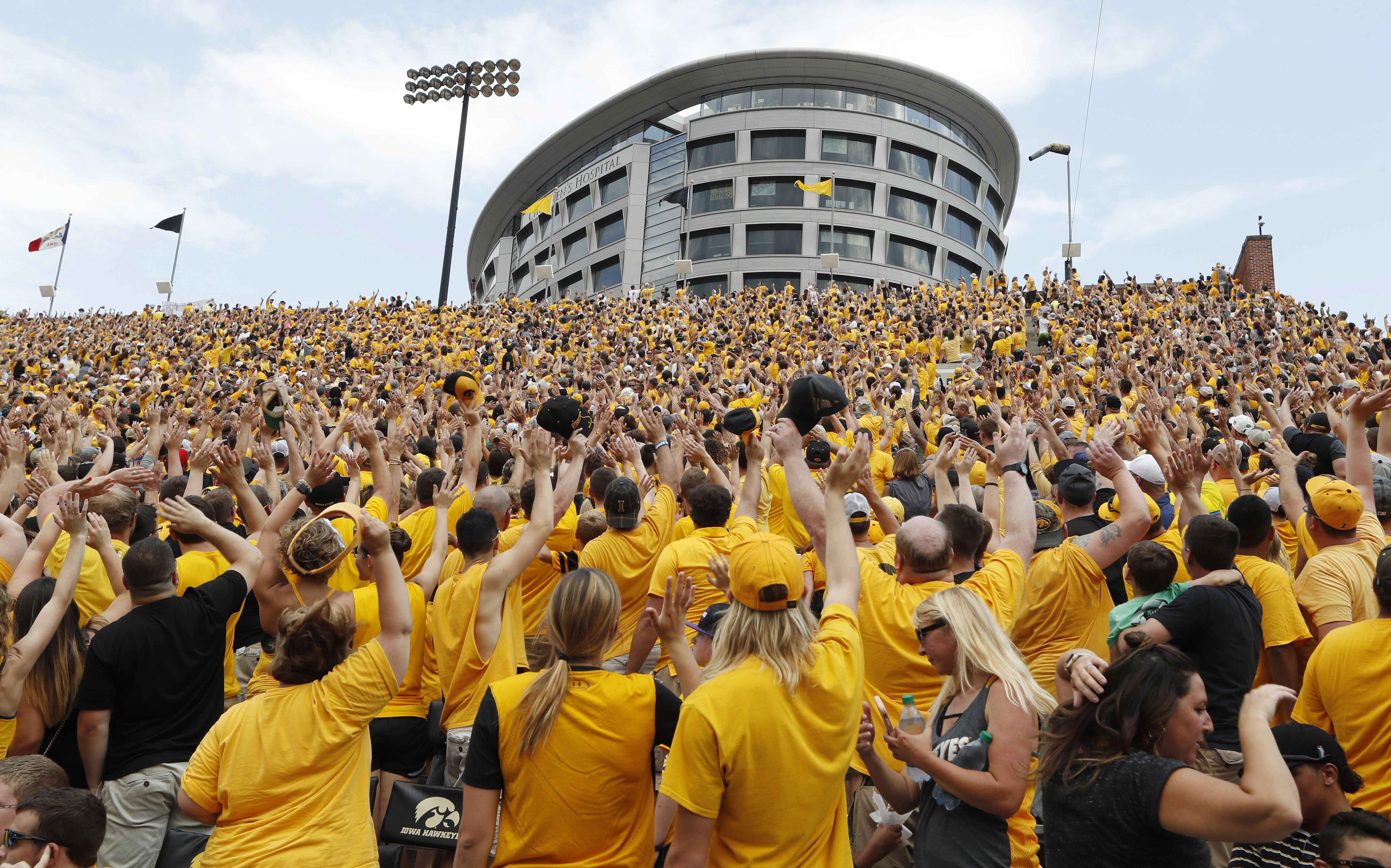 Fans wave