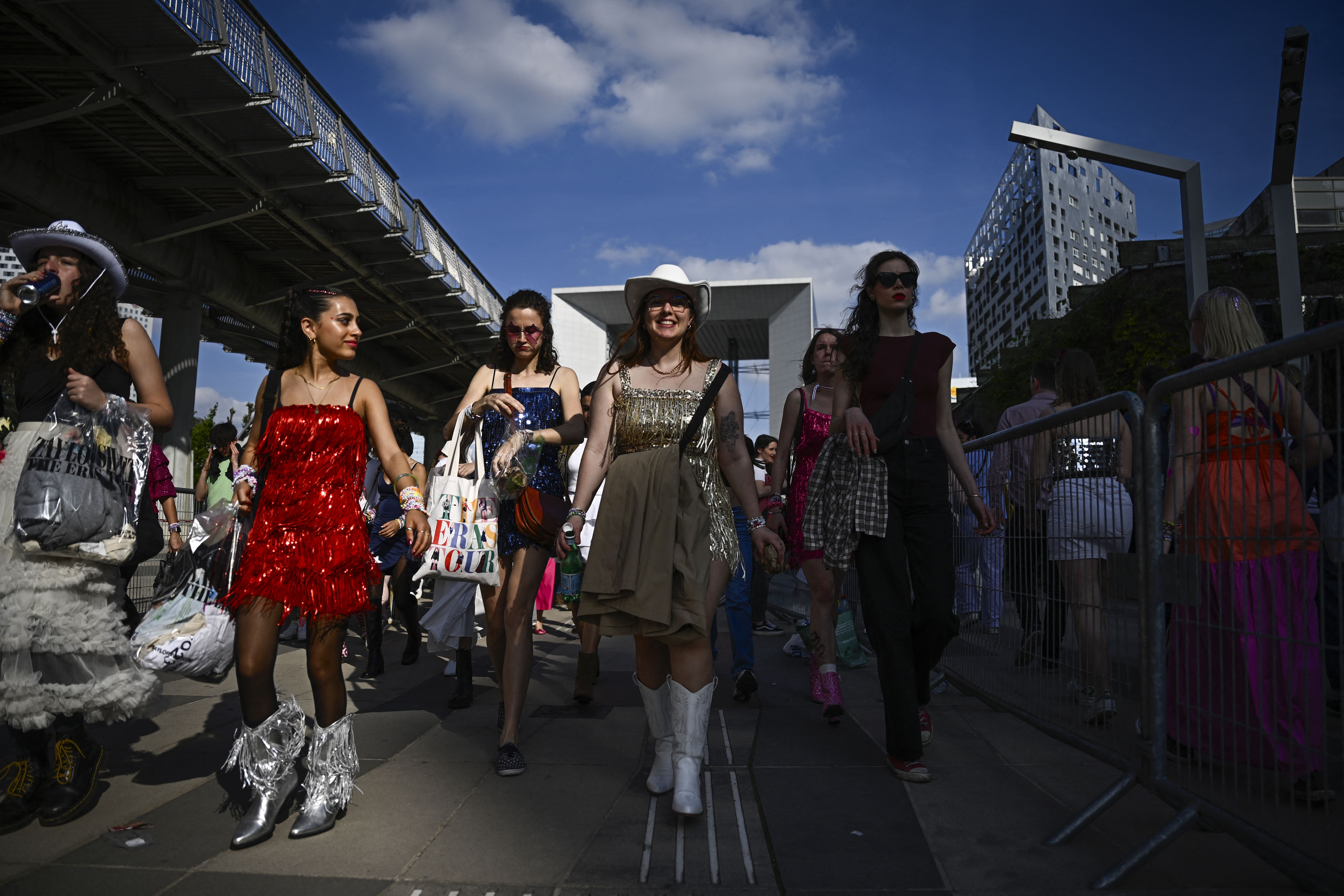 Fans of US singer and songwriter Taylor Alison Swift, also known as Taylor Swift, arrive to attend the concert at the Paris La Defense Arena as part of her The Eras Tour, in Nanterre, north-western France, on May 9, 2024.