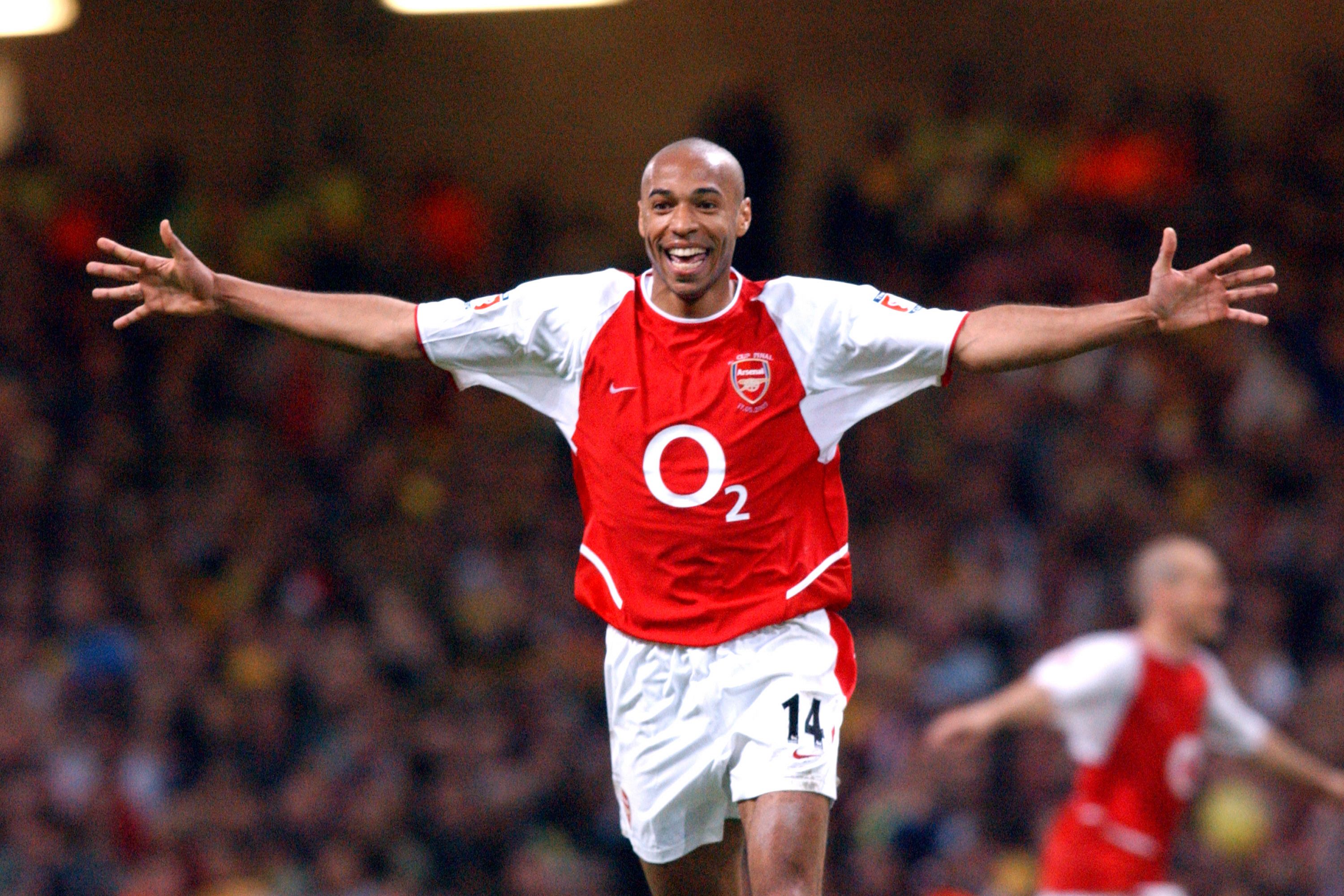thierry henry arms out