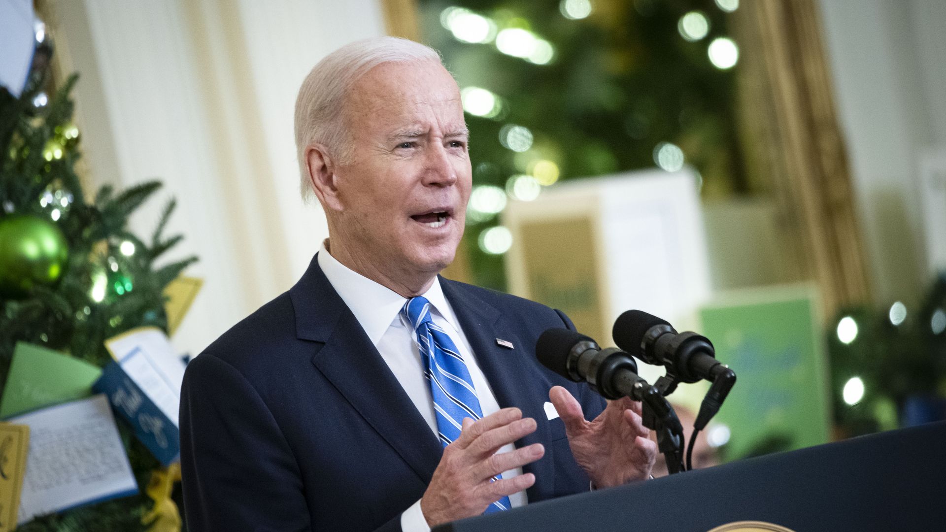 Photo of Joe Biden speaking from a podium in the White House