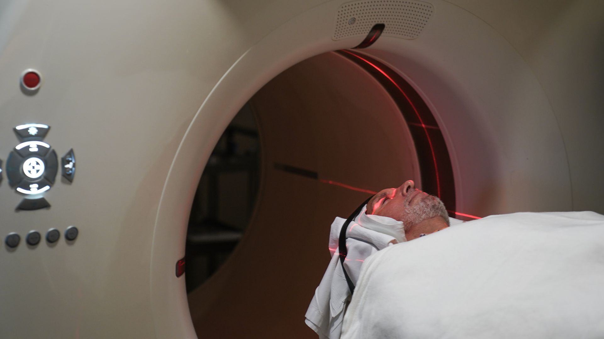 Picture of a person about to receive a PET scan