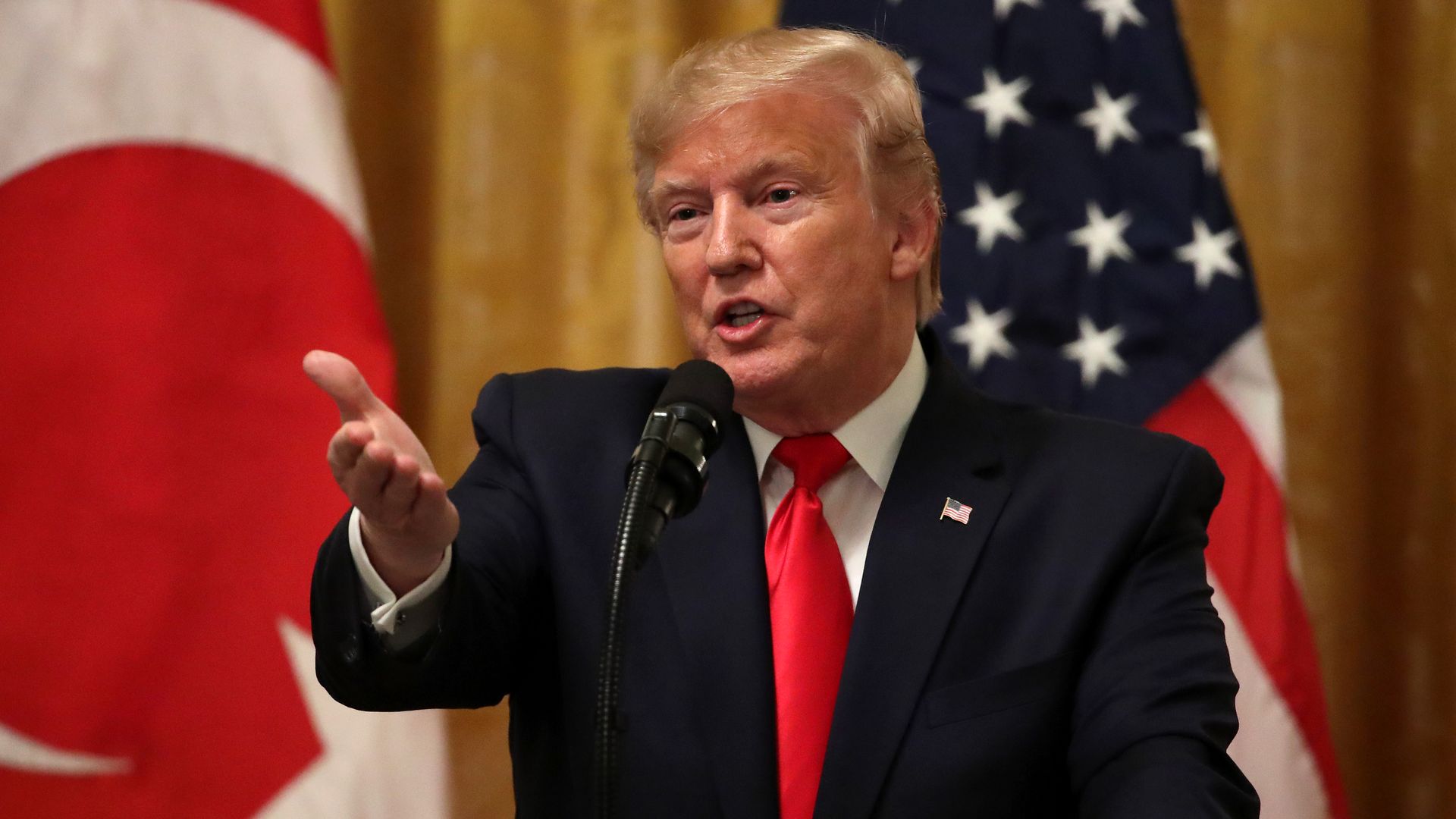 Presidet trump at a podium