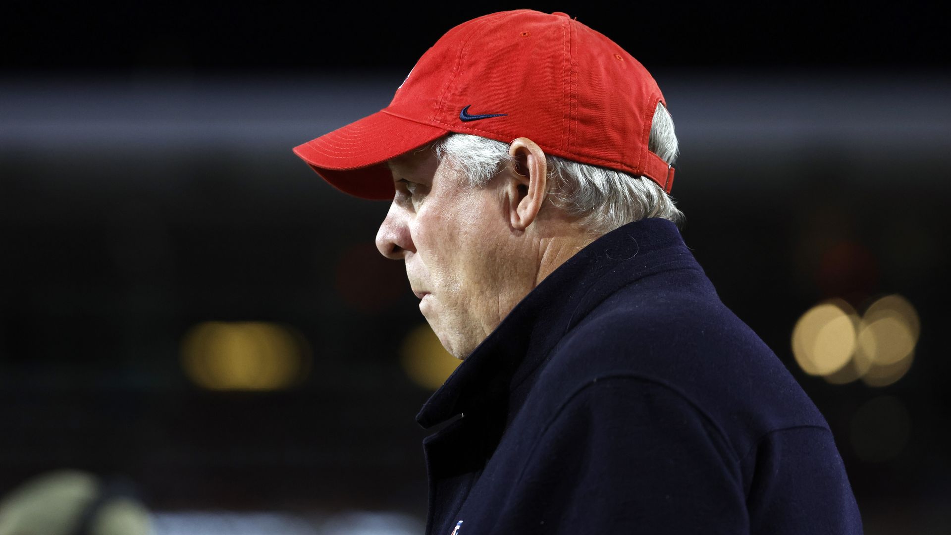 A man in a baseball cap.