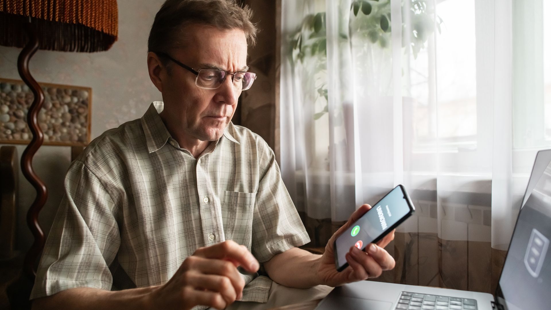 A man looking at his phone.