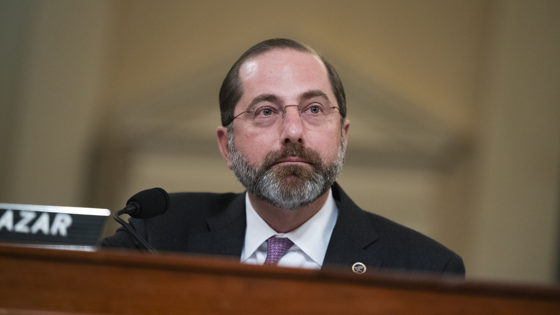 In this image, Azar sits