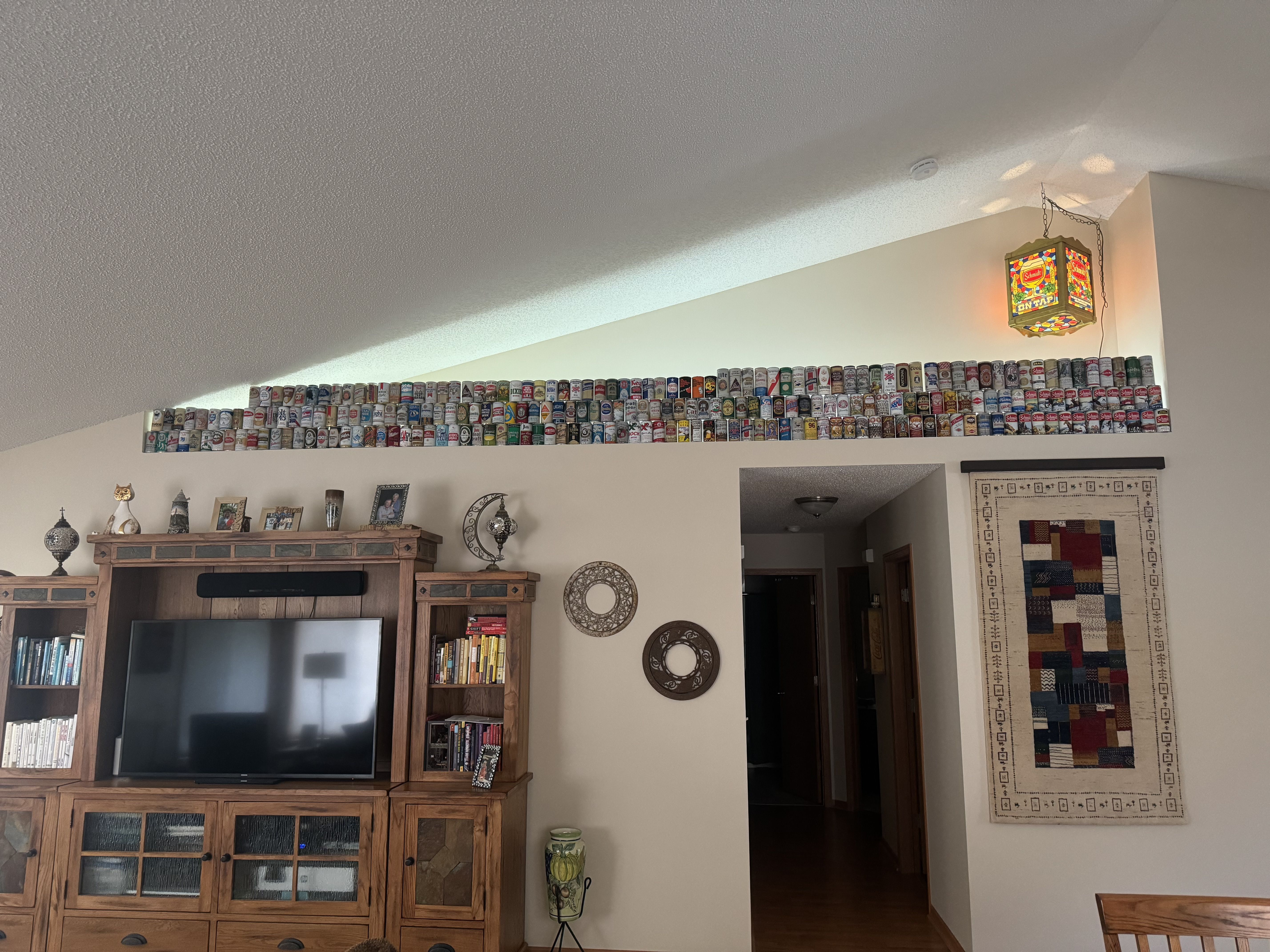 beer cans displayed in a living room
